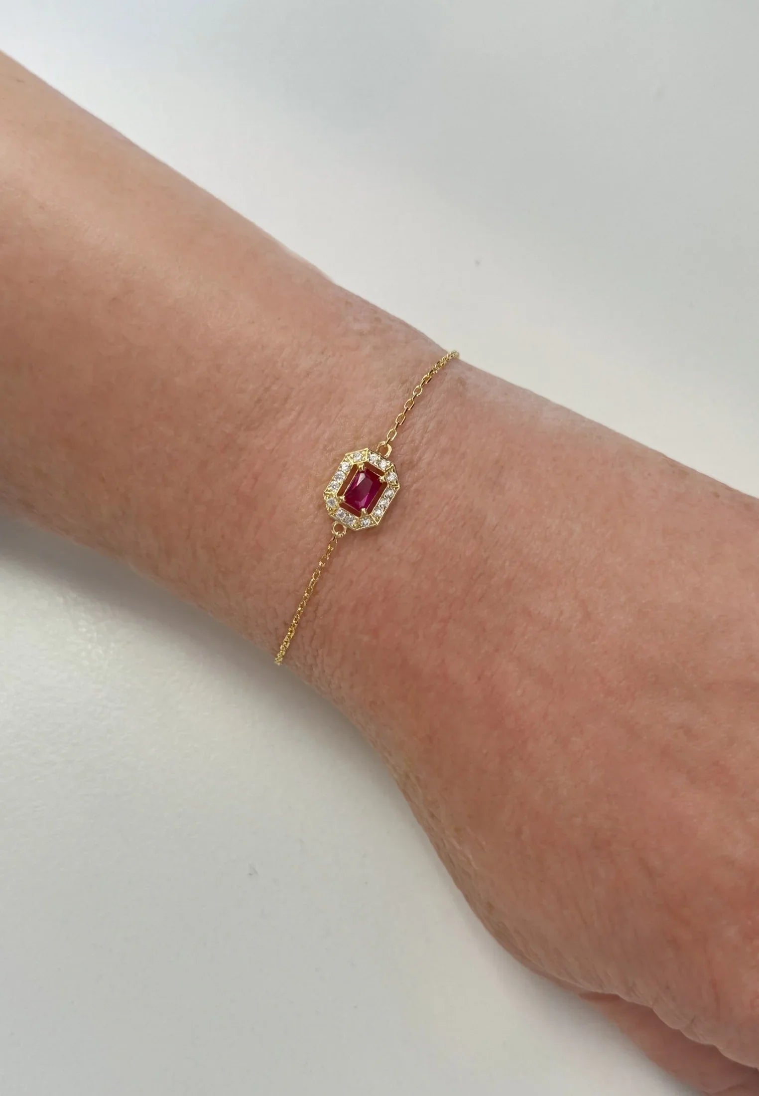 The bracelet on an arm.