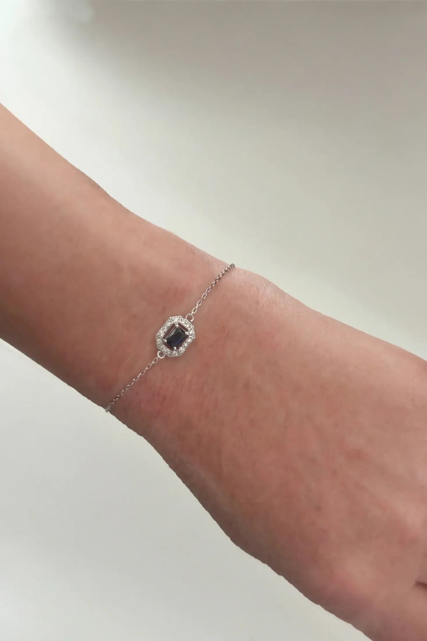 The bracelet on an arm.