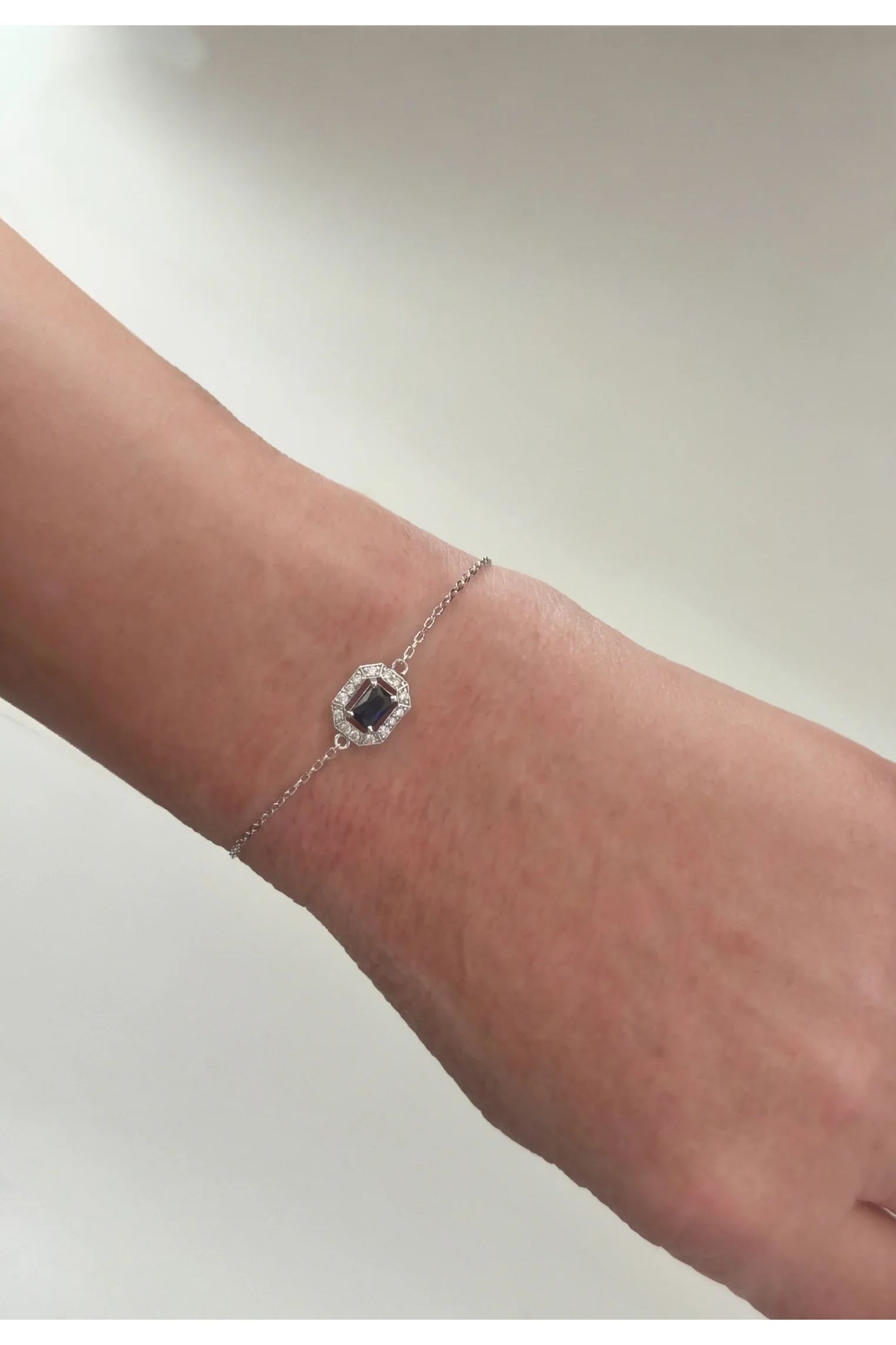 The bracelet on an arm.