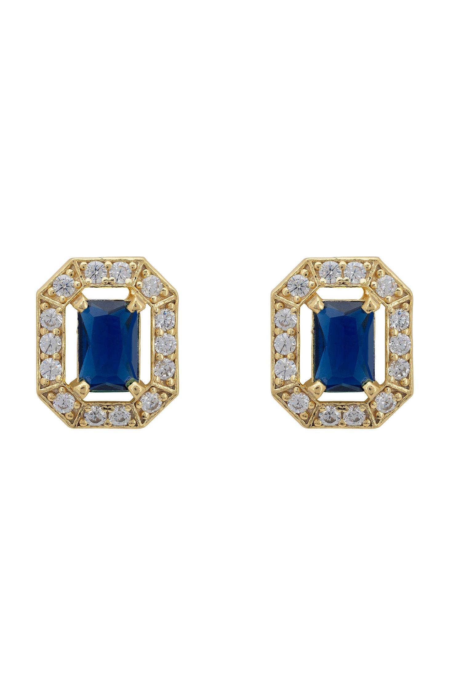 Pair of gold earrings with blue gemstones on a white background