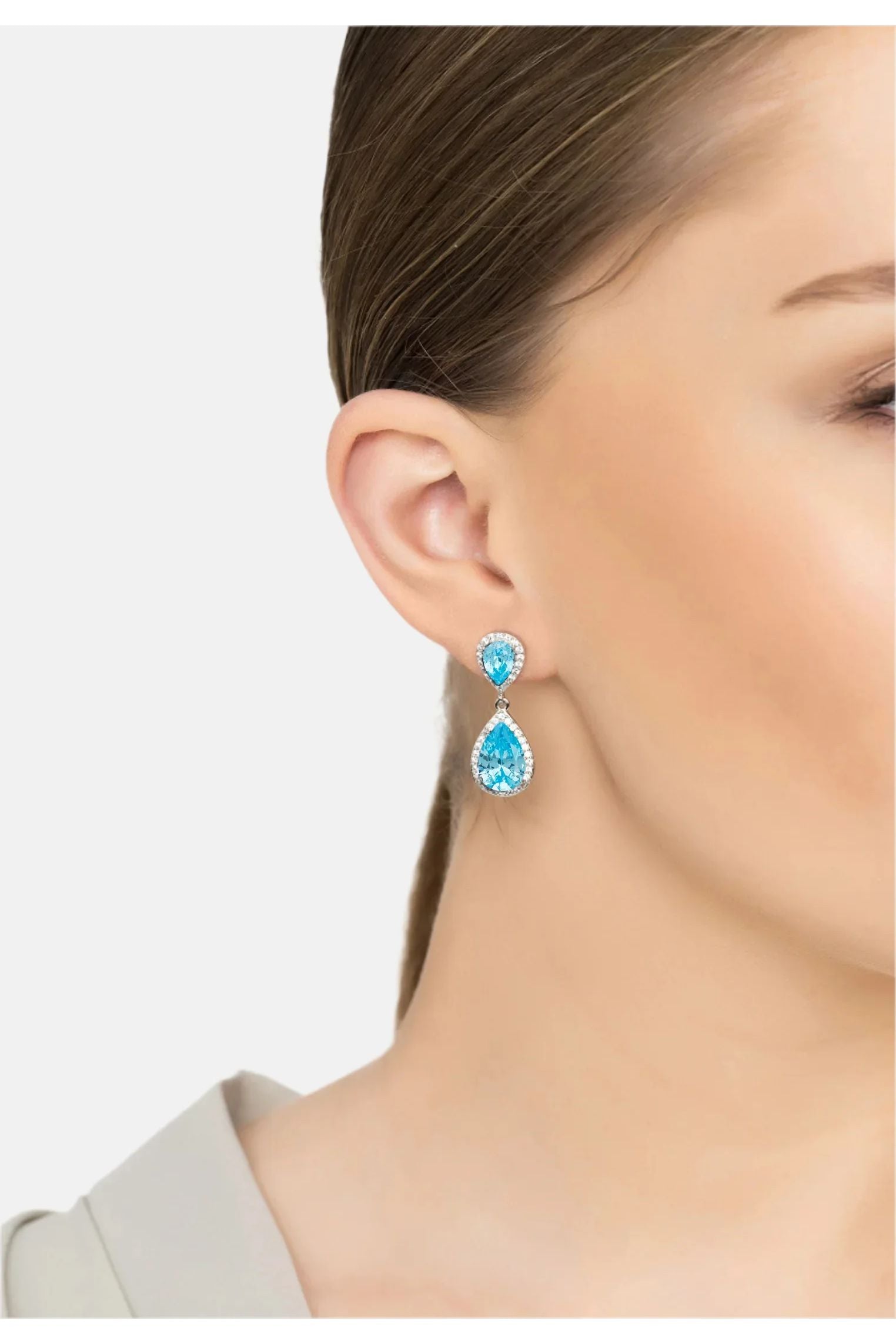 The earring worn by a model.