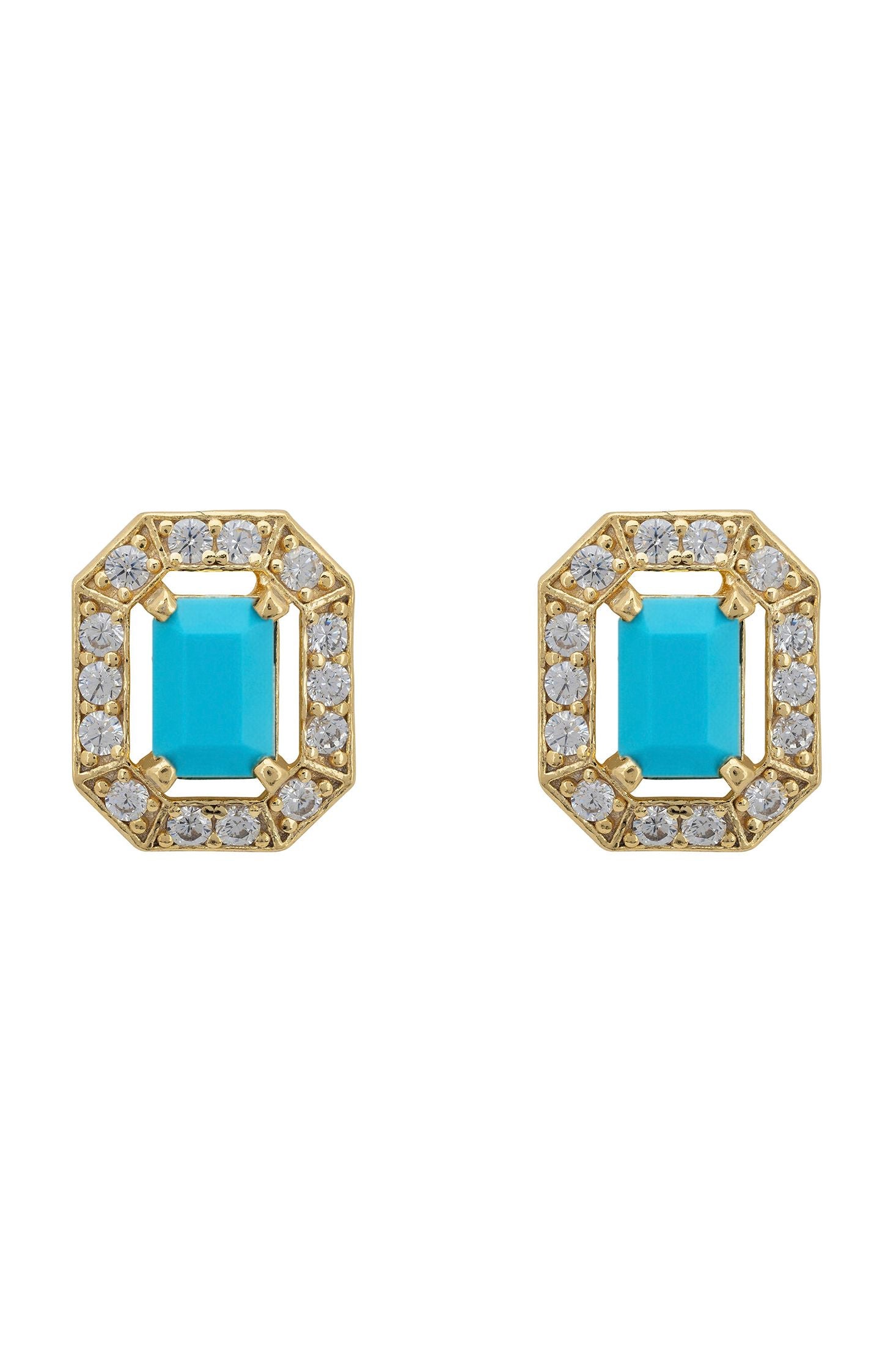 Pair of gold-framed earrings with turquoise centers on a white background