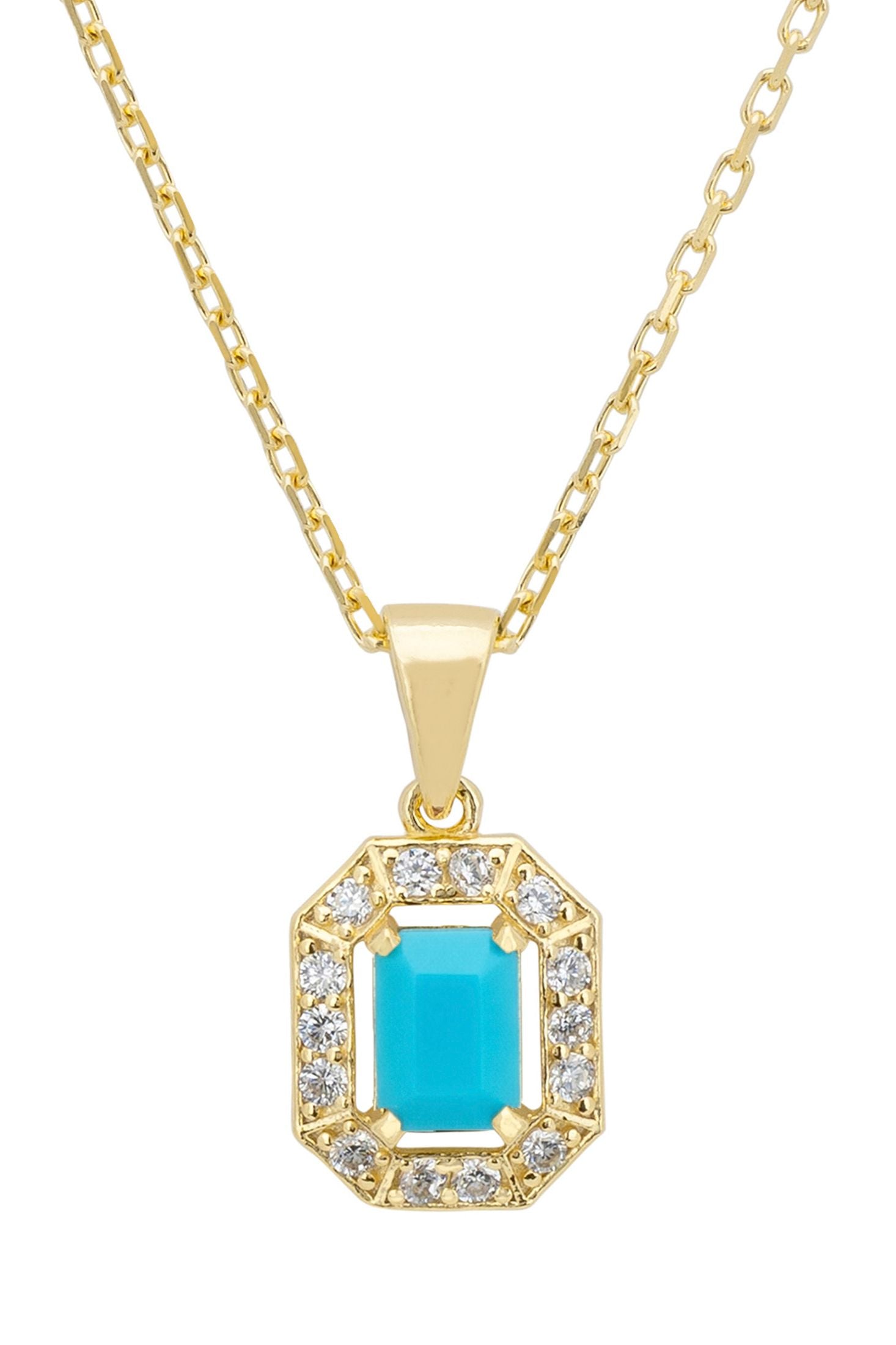 Gold necklace with a turquoise pendant on a white background