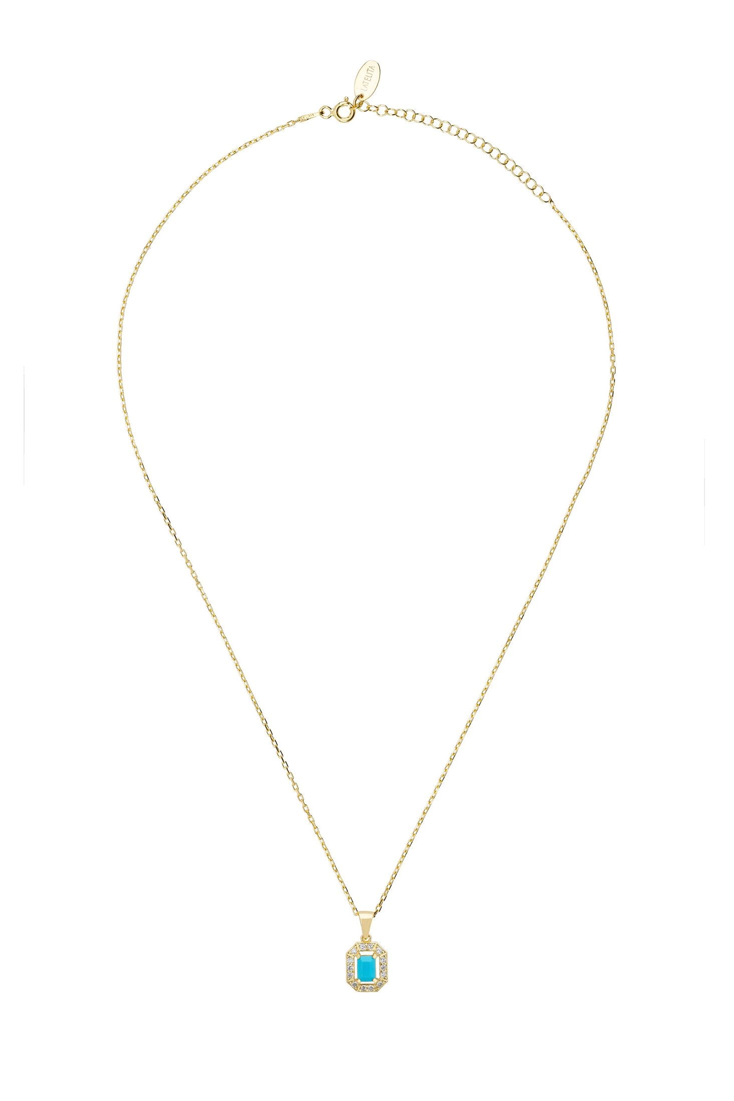 Gold necklace with a turquoise pendant on a white background