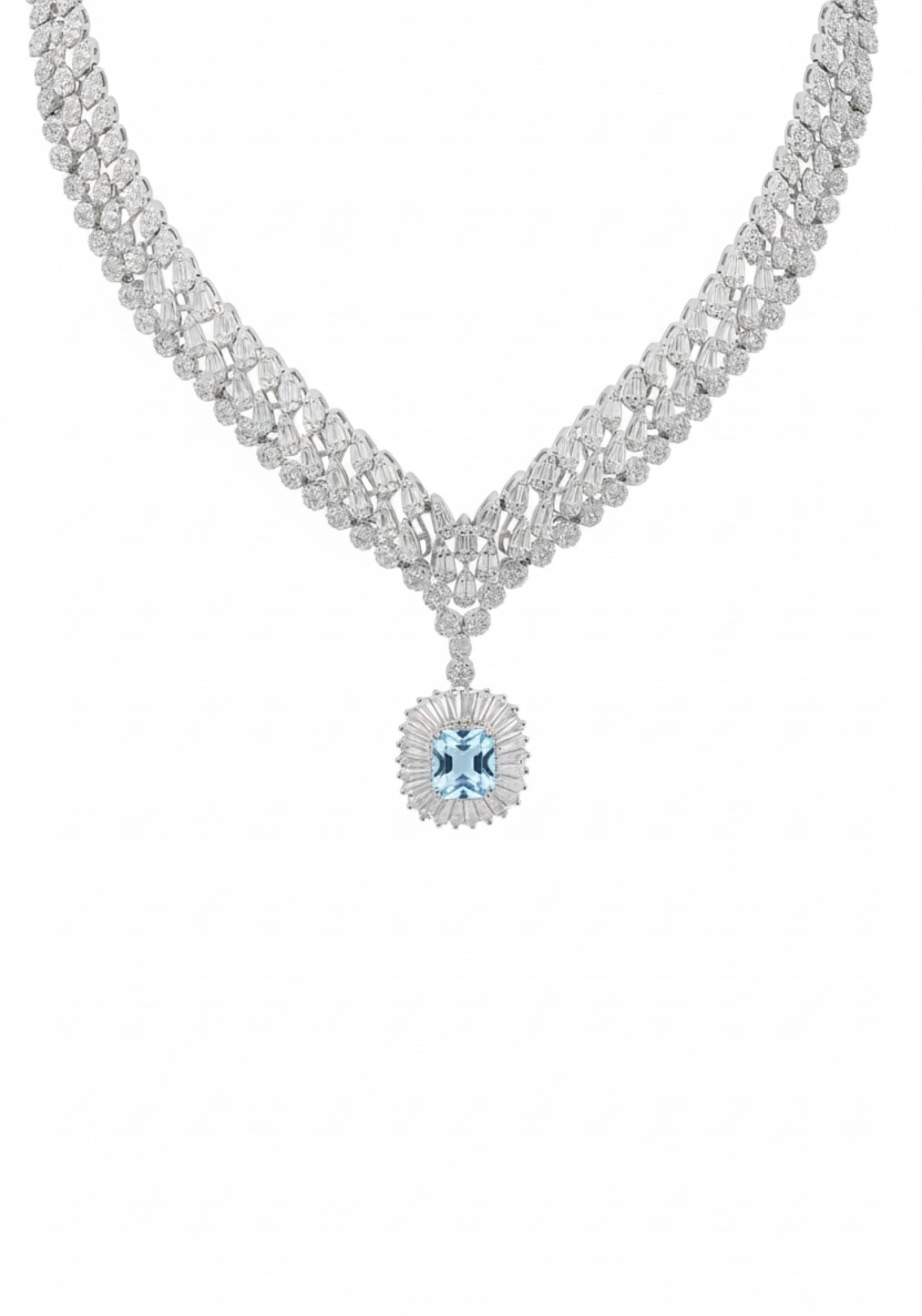 Delicate necklace with a central blue gemstone on a white background