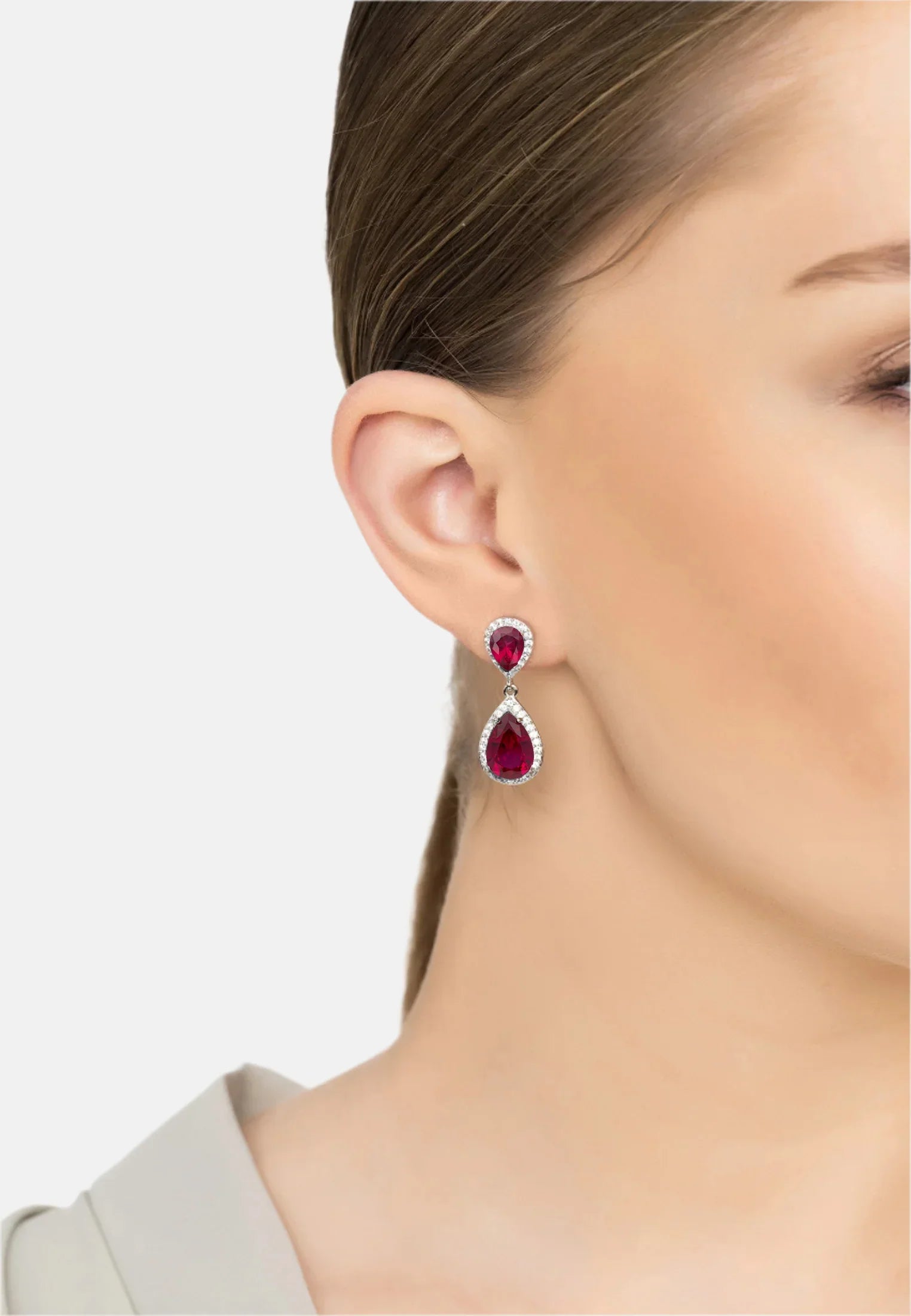 The earring worn by a model.