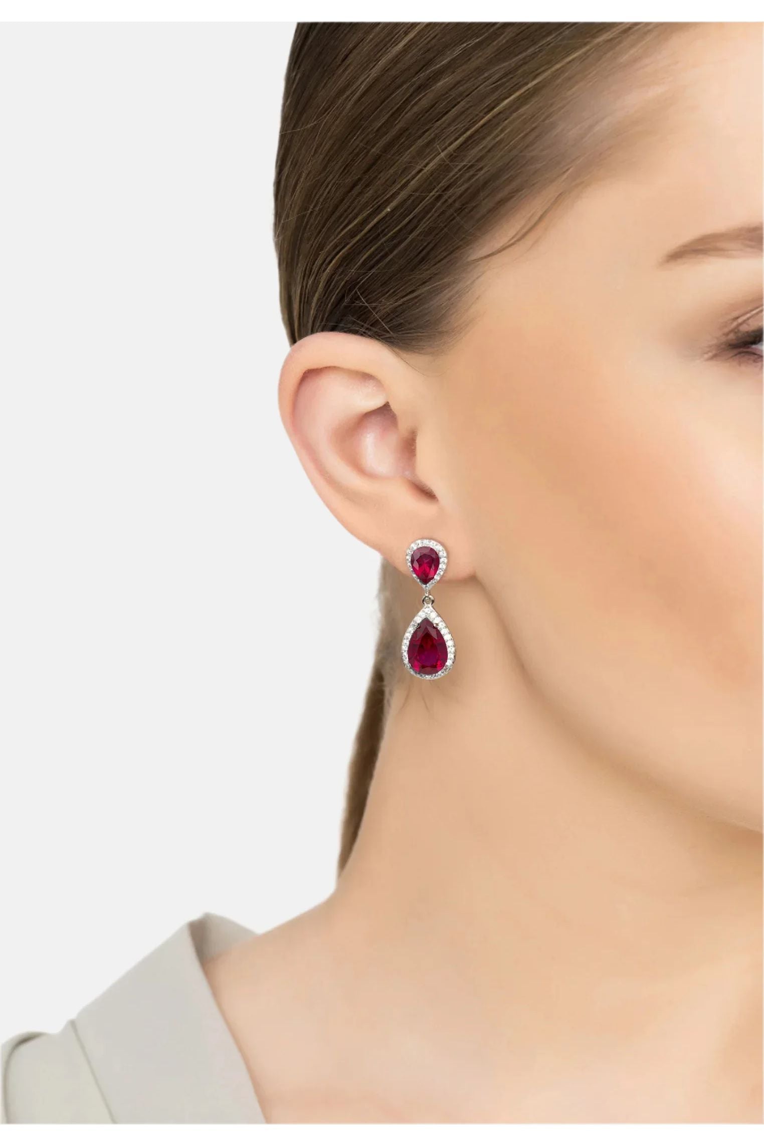 The earring worn by a model.