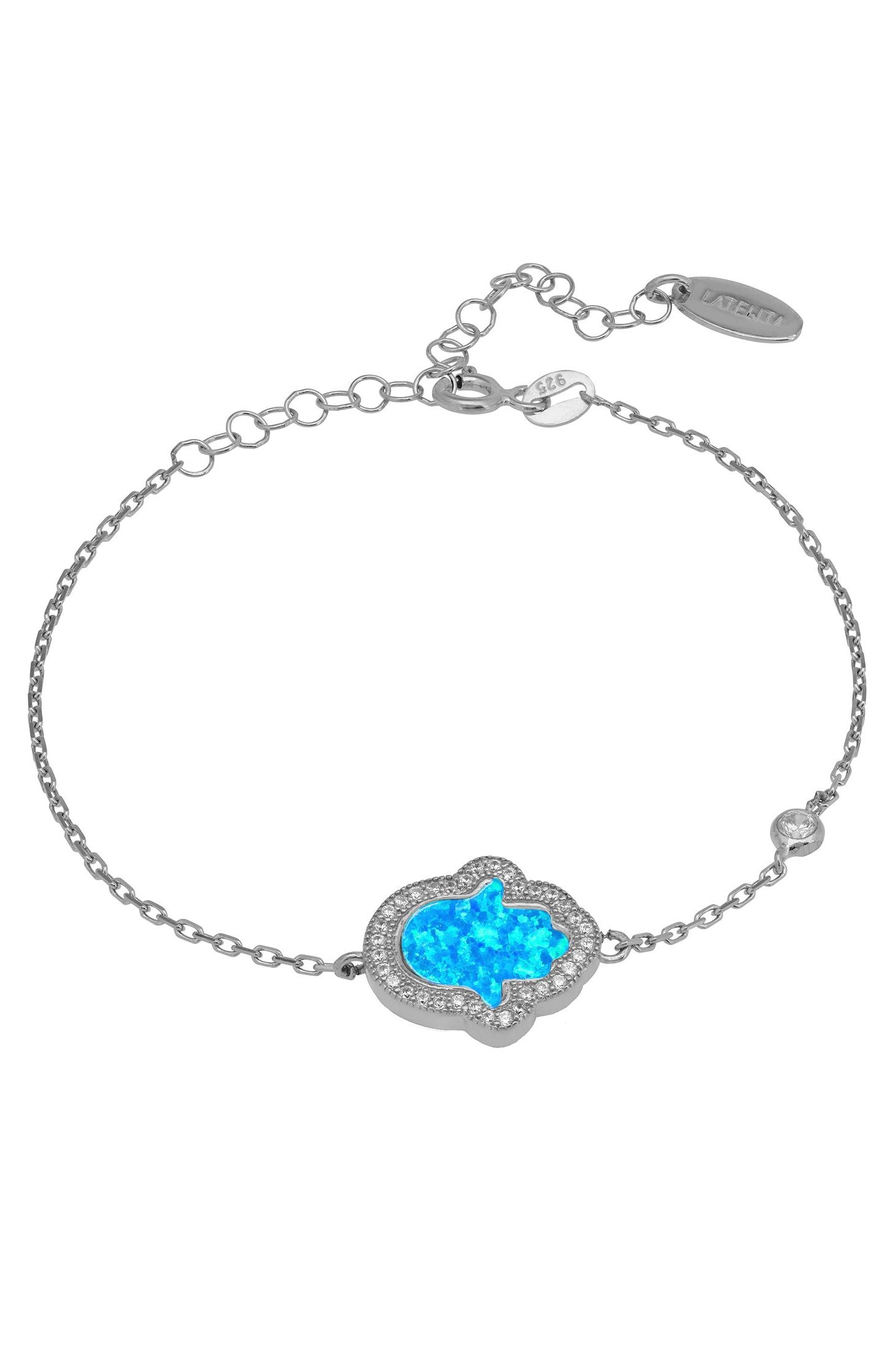 Silver bracelet with a blue heart-shaped gem on a white background