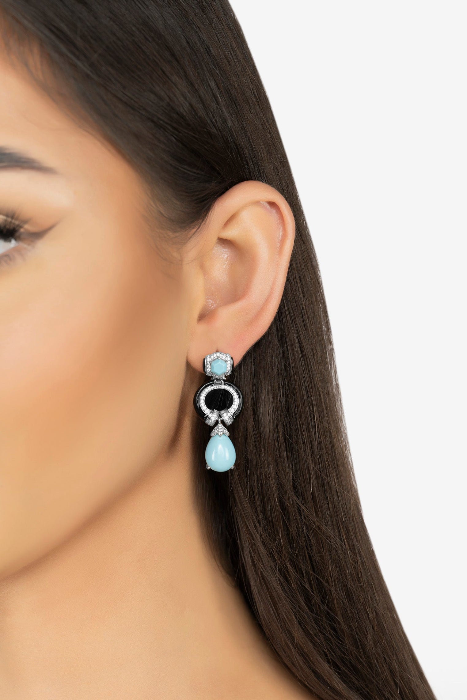 The earring worn by a model.