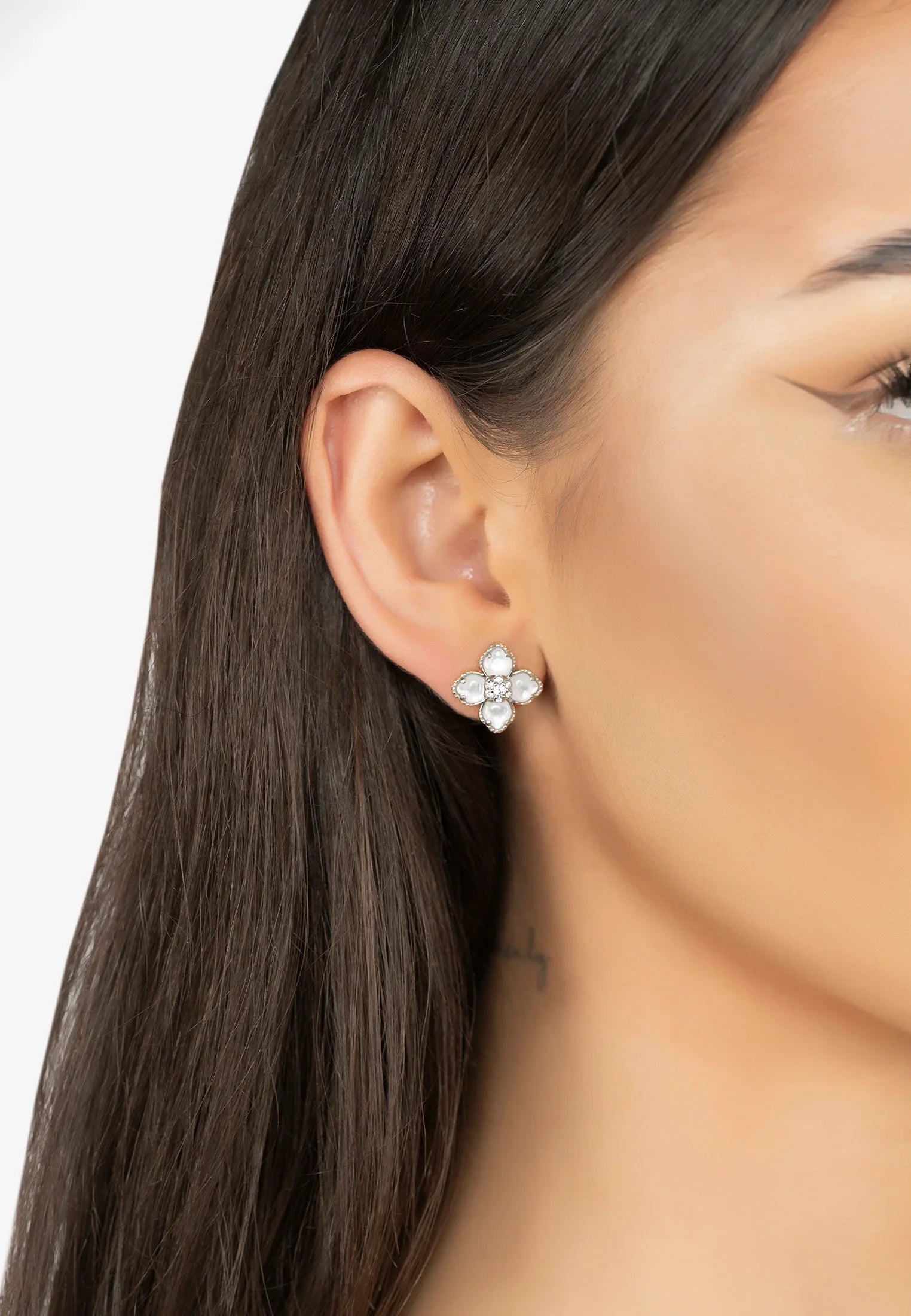 The earring worn by a model.