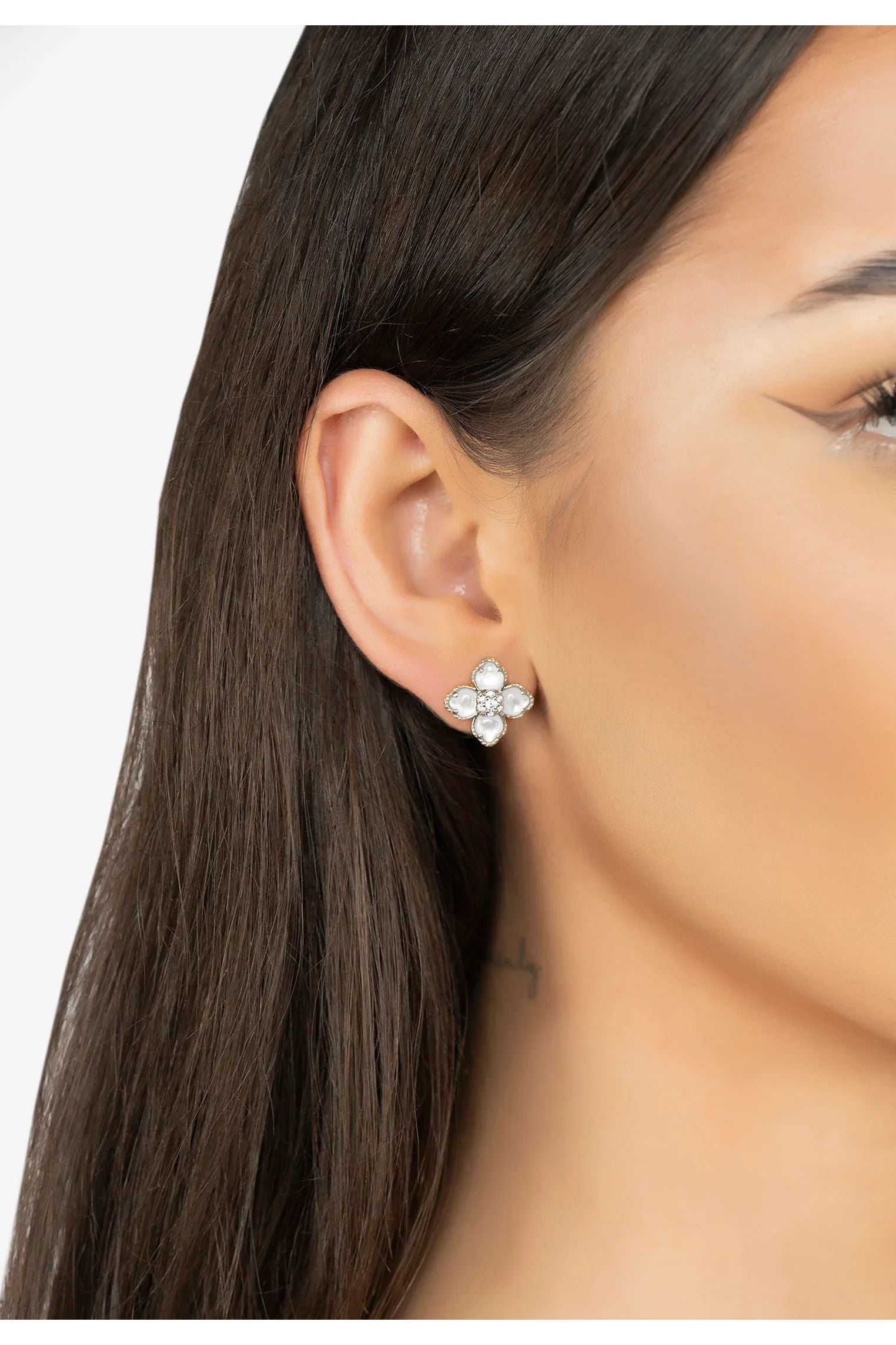 The earring worn by a model.
