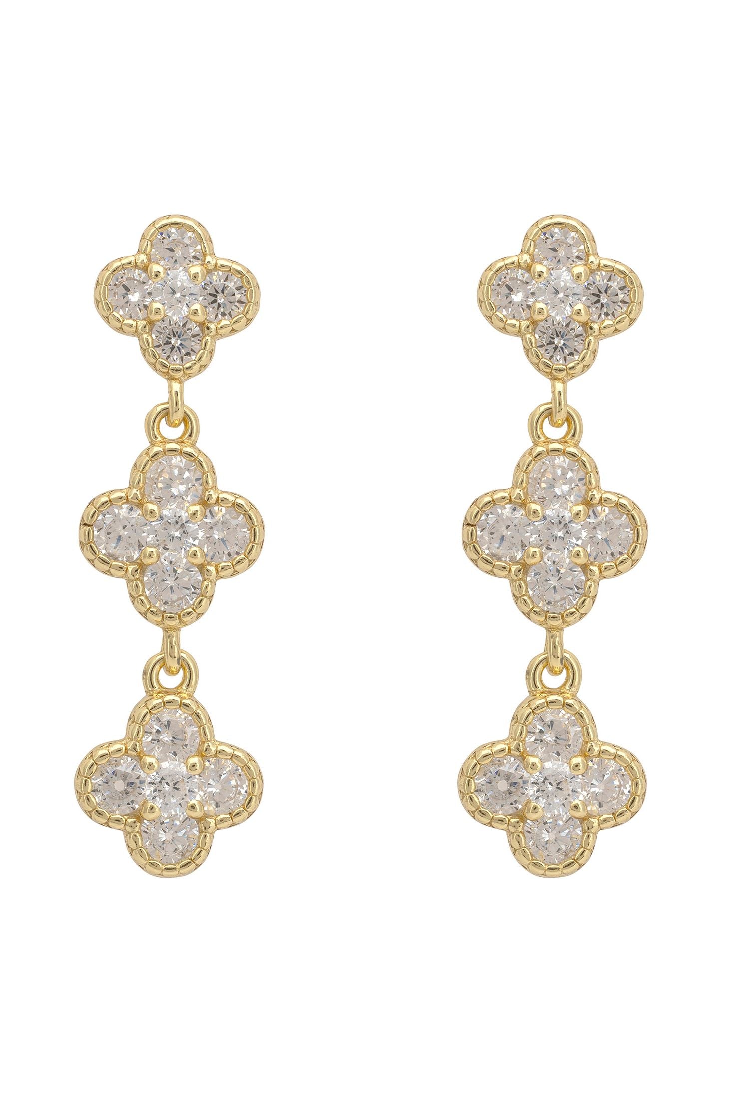 Gold and diamond earrings on a white background