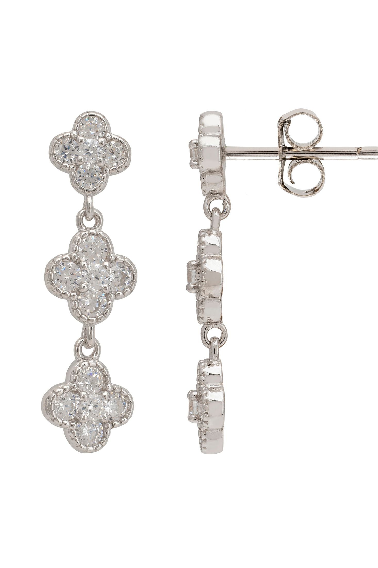 Silver earrings with clover-shaped designs on a white background