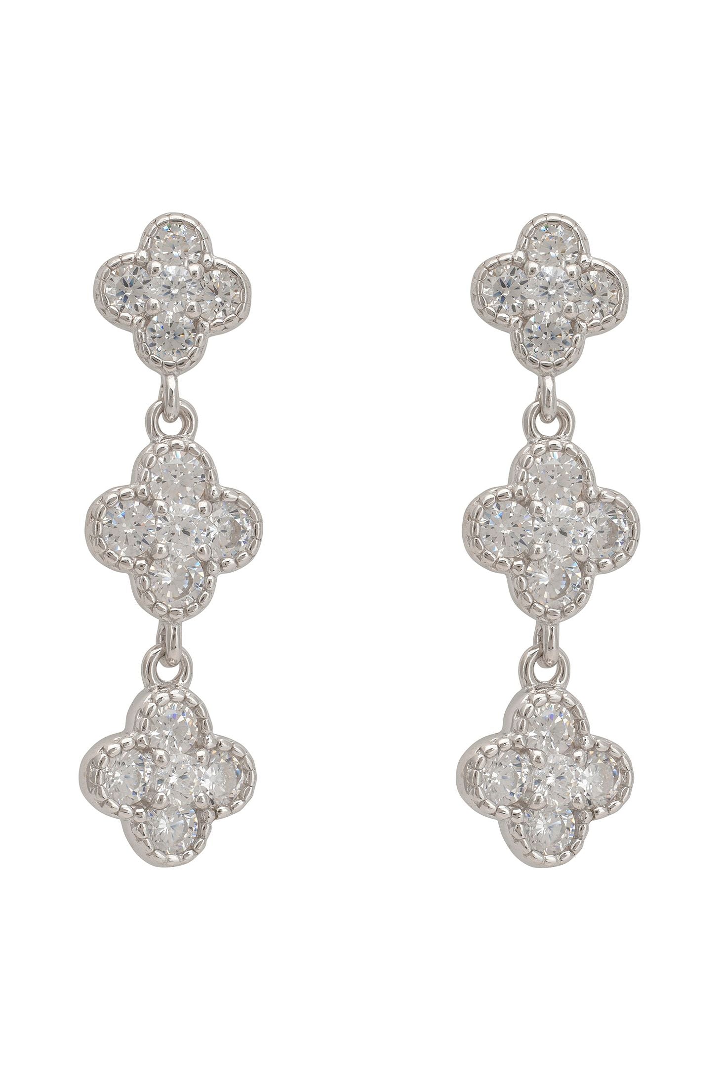 Pair of silver earrings with clover-shaped designs on a white background