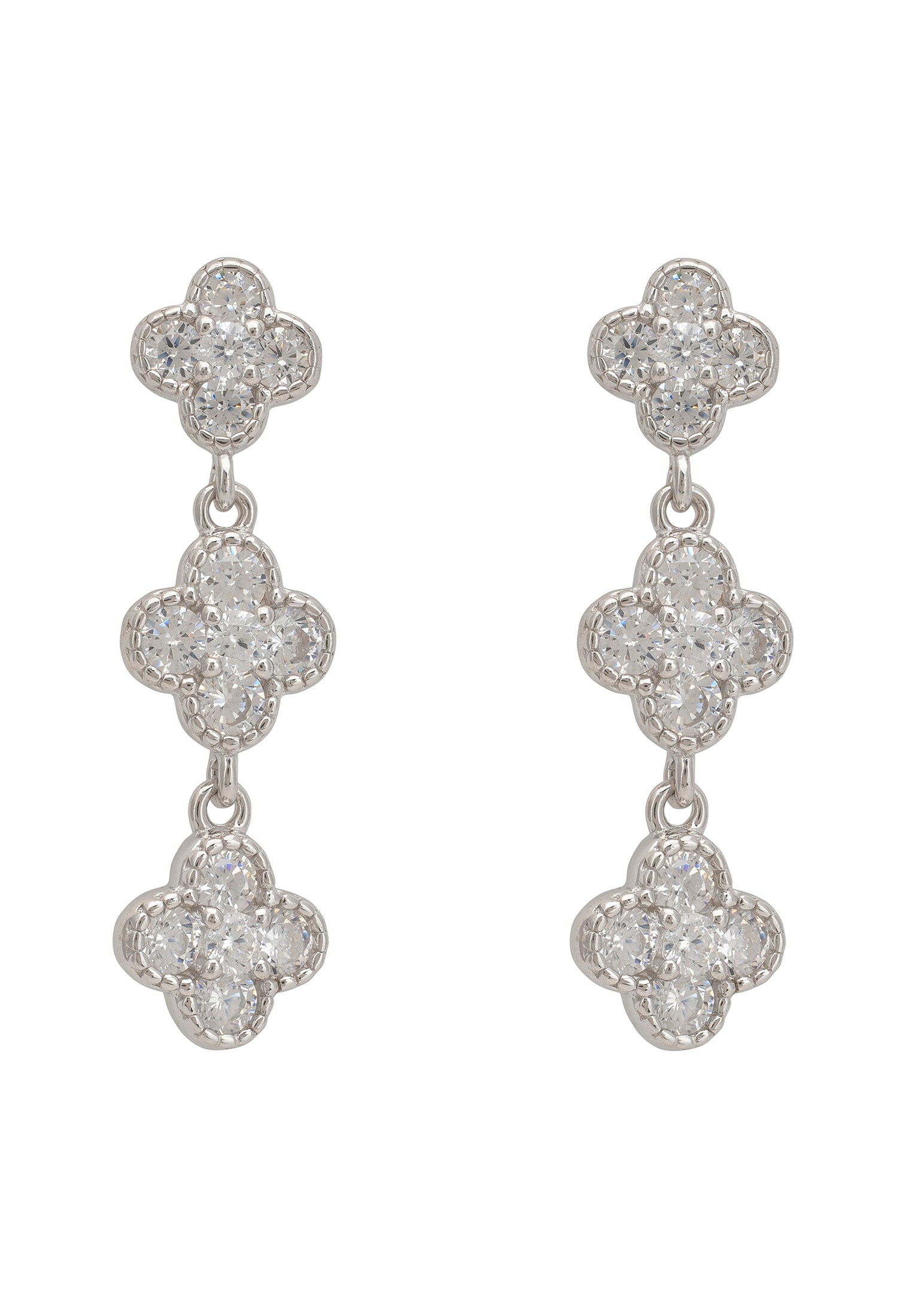 Pair of silver earrings with clover-shaped designs on a white background