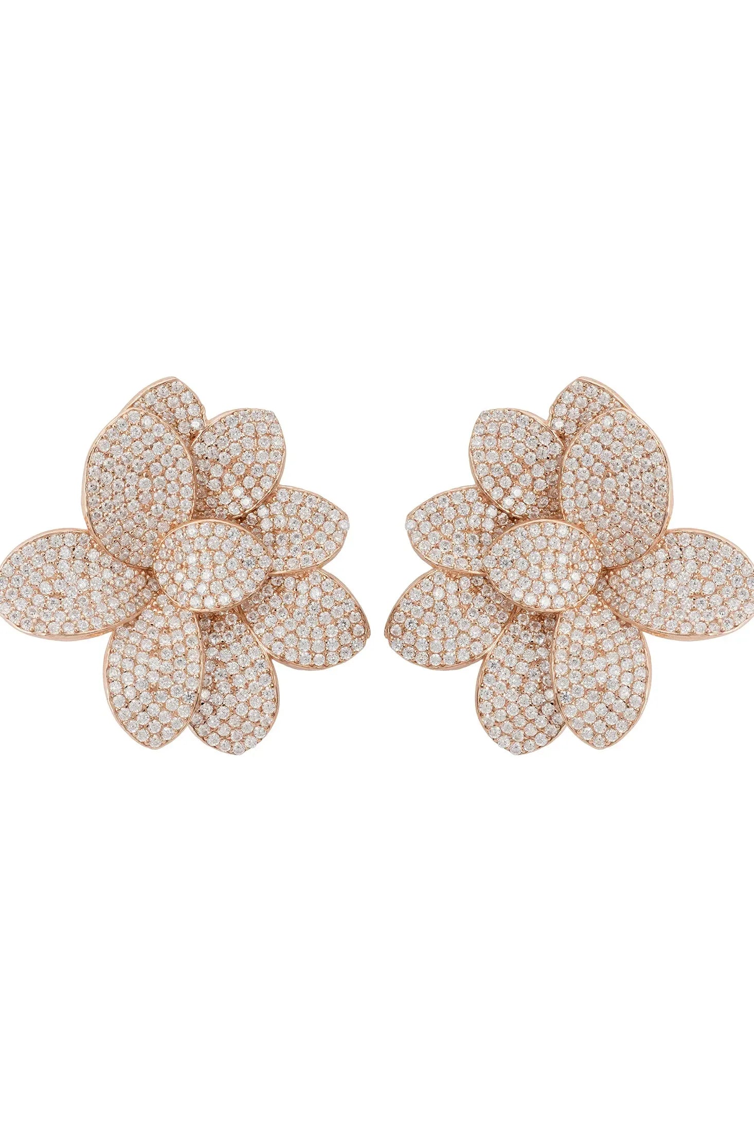 Diamond flower earrings on a white background.