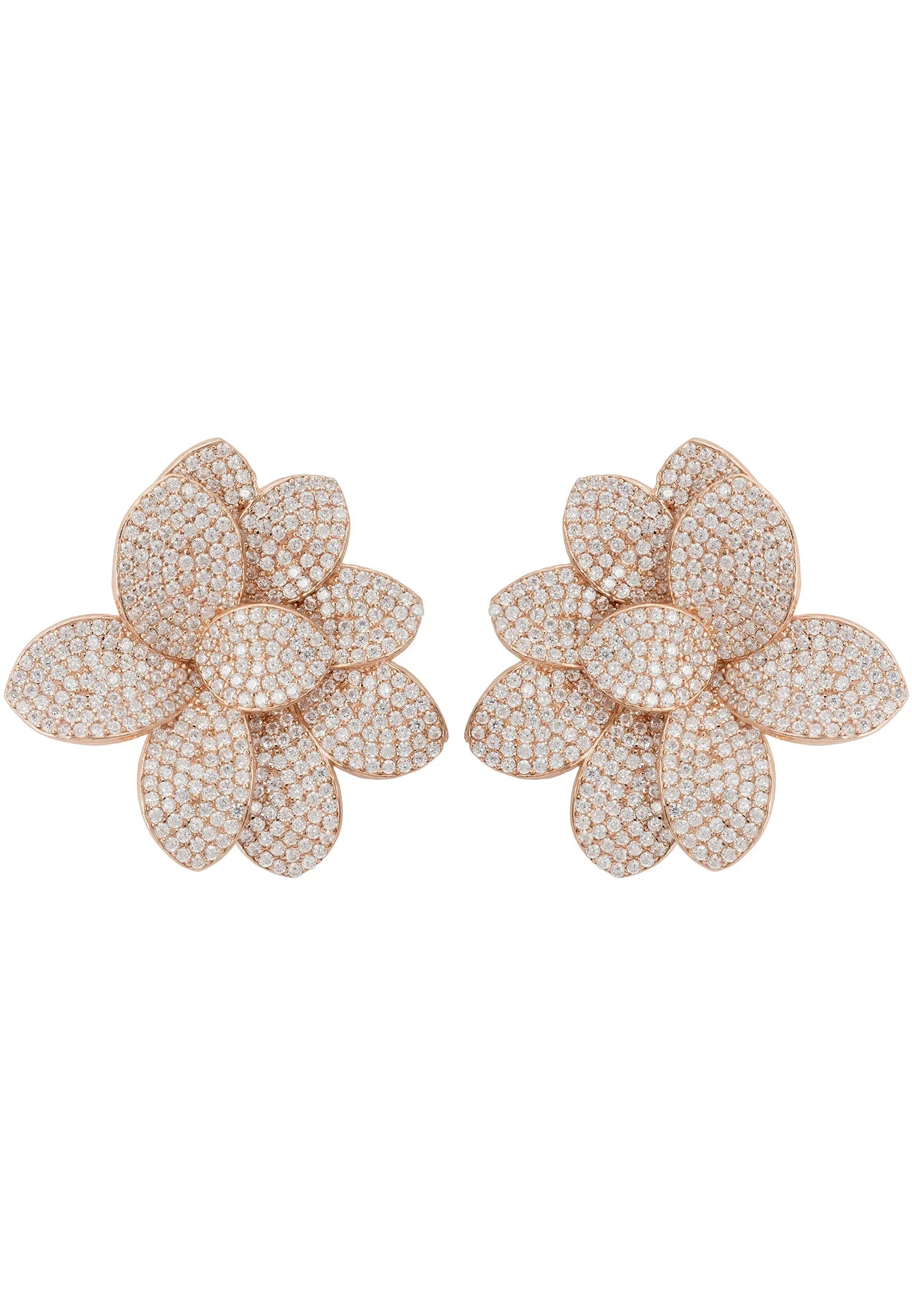 Diamond flower earrings on a white background.