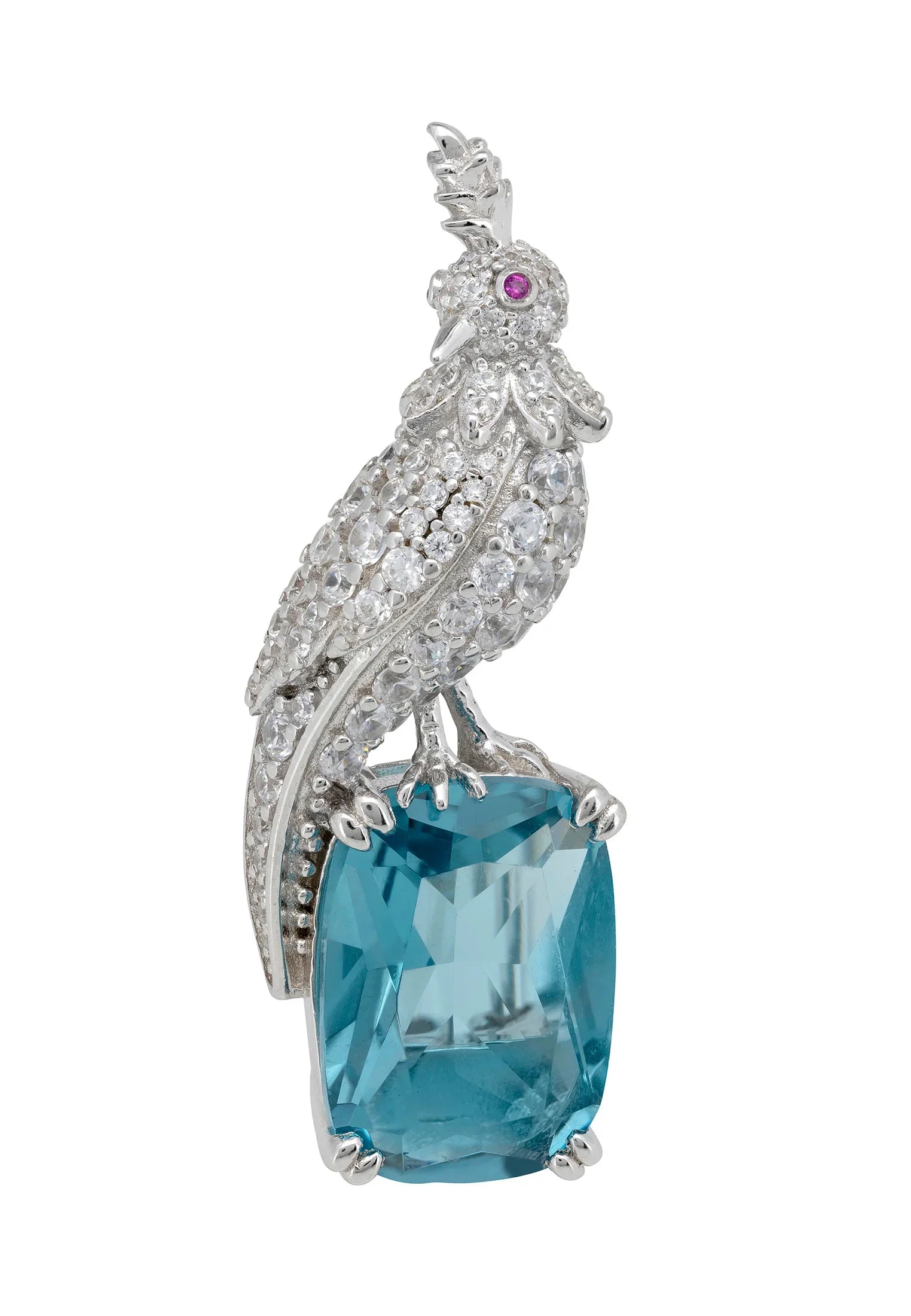 Brooch of a diamond bird perched on a blue gemstone.