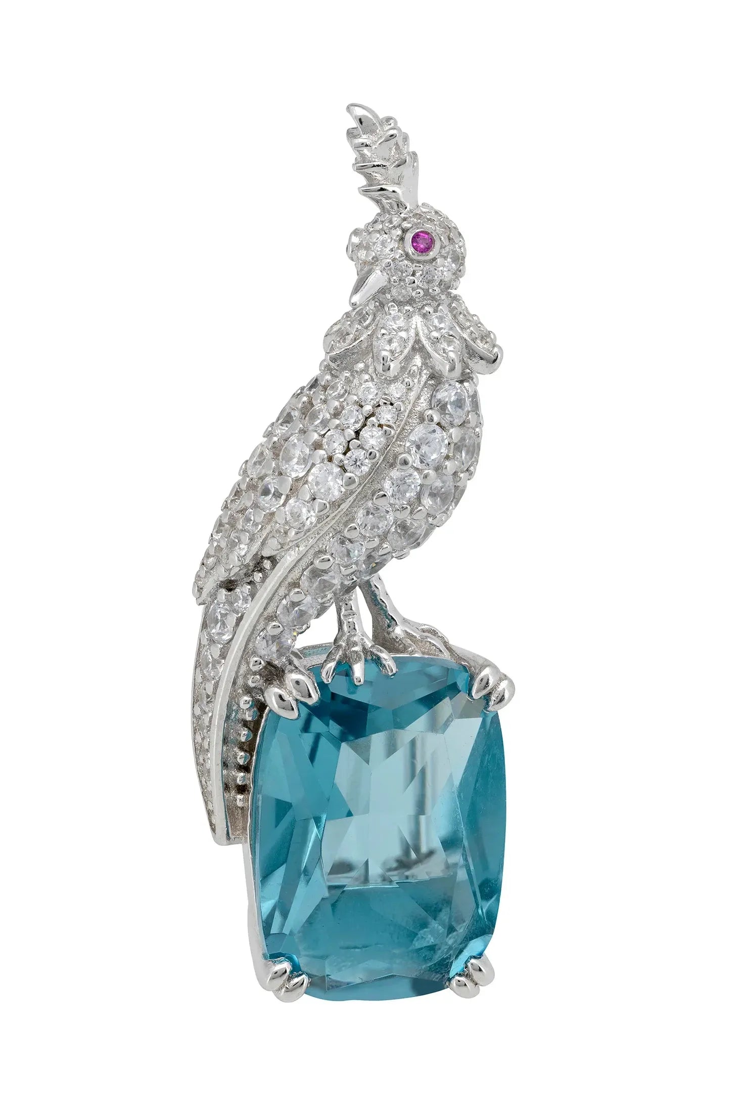 Brooch of a diamond bird perched on a blue gemstone.