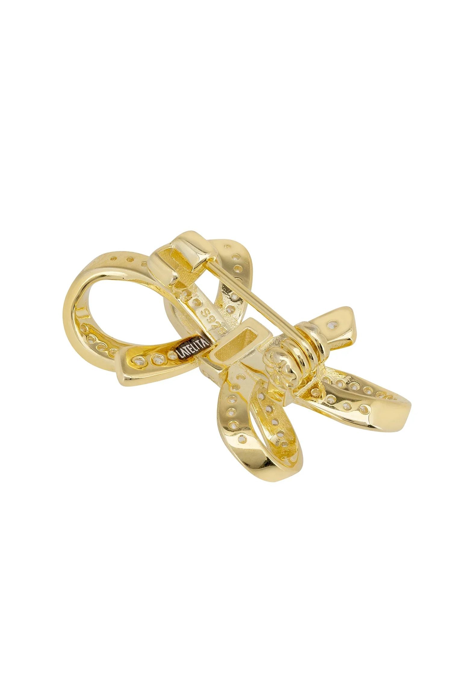 Gold pin back of the brooch.