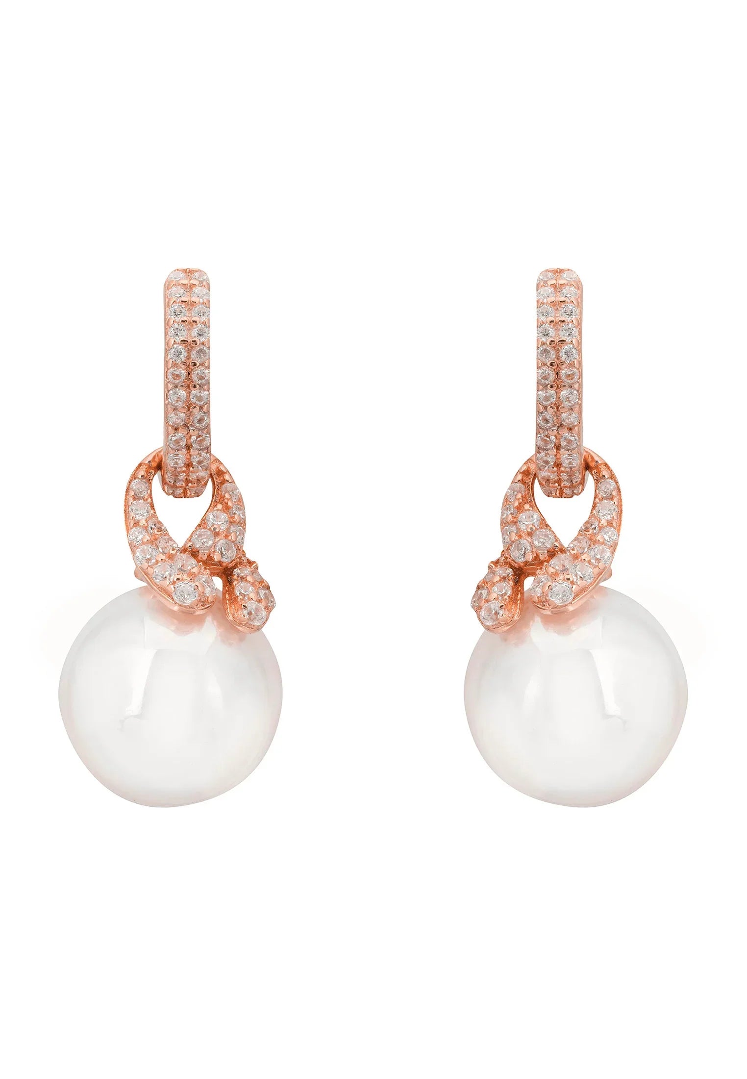 Rose gold knot and pearl earrings.