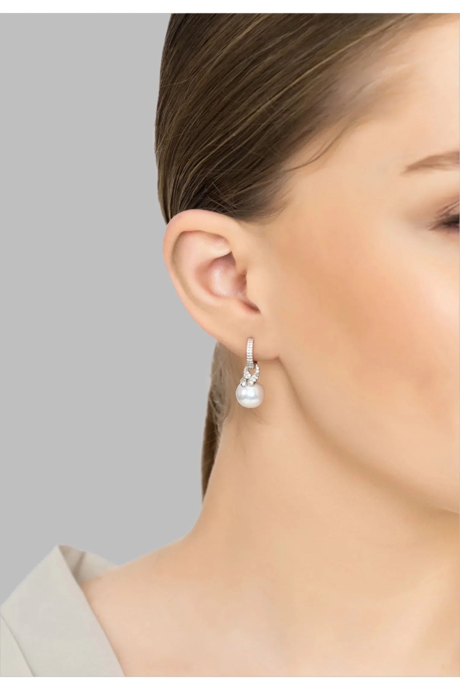 The earring worn by a model.