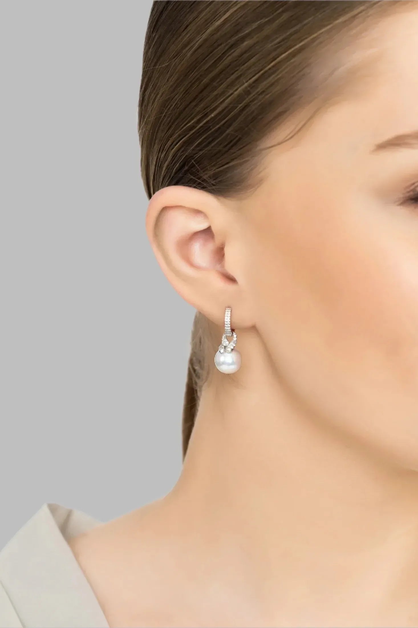 The earring worn by a model.