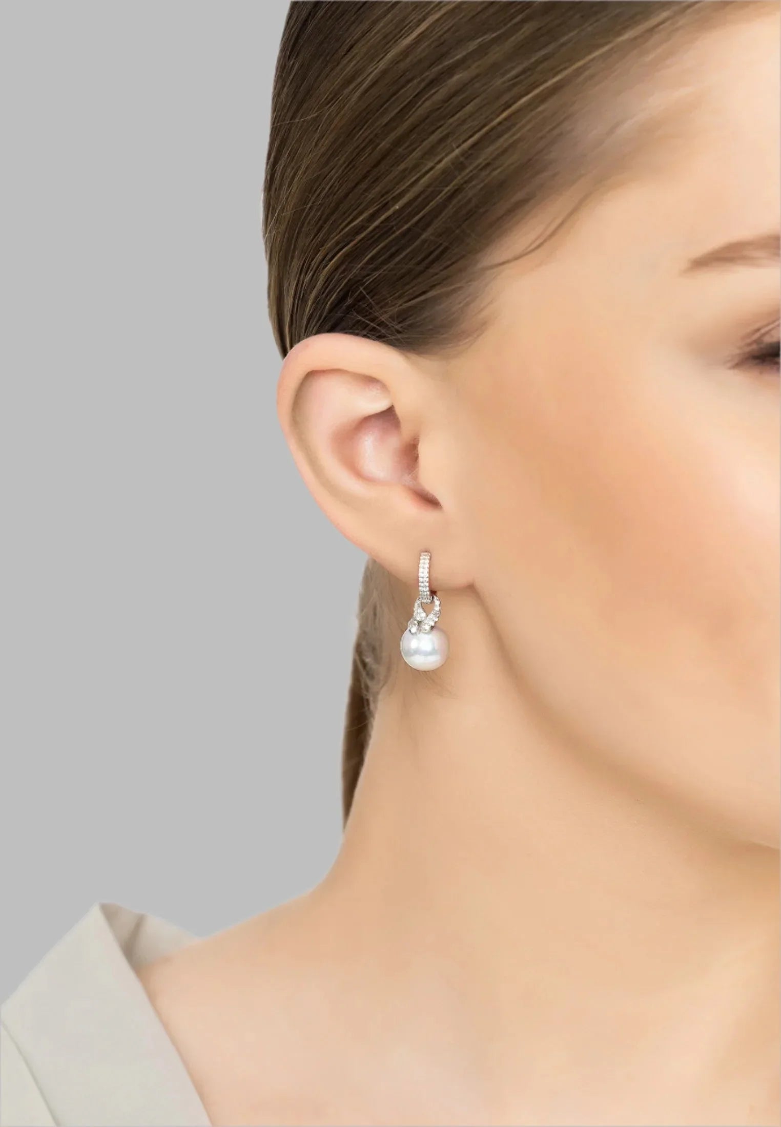 The earring worn by a model.