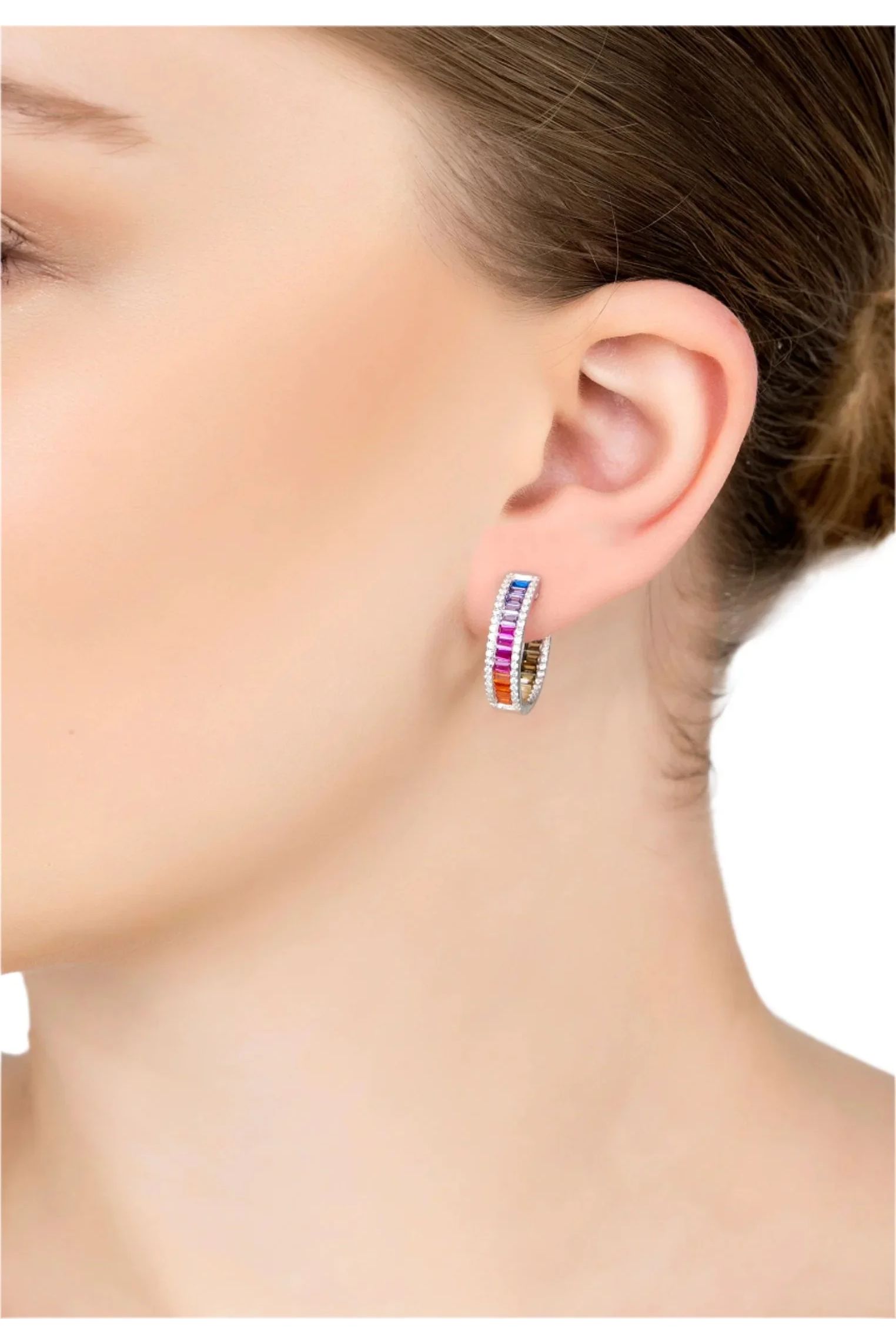 The earring worn by a model.