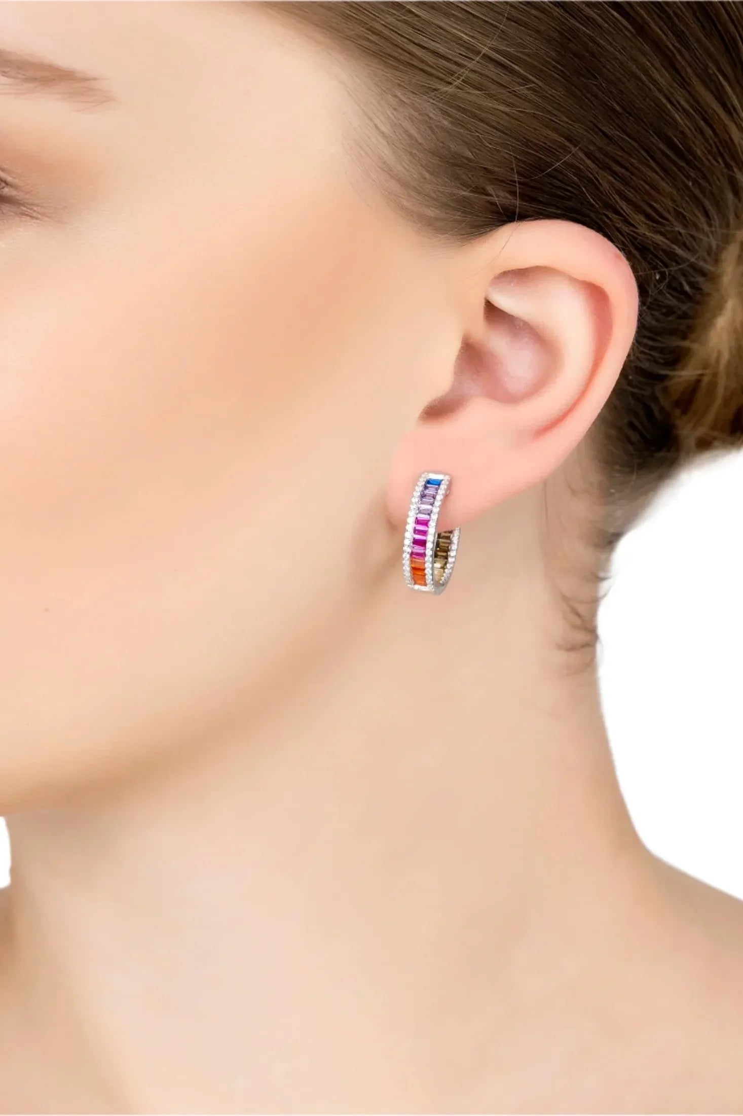 The earring worn by a model.