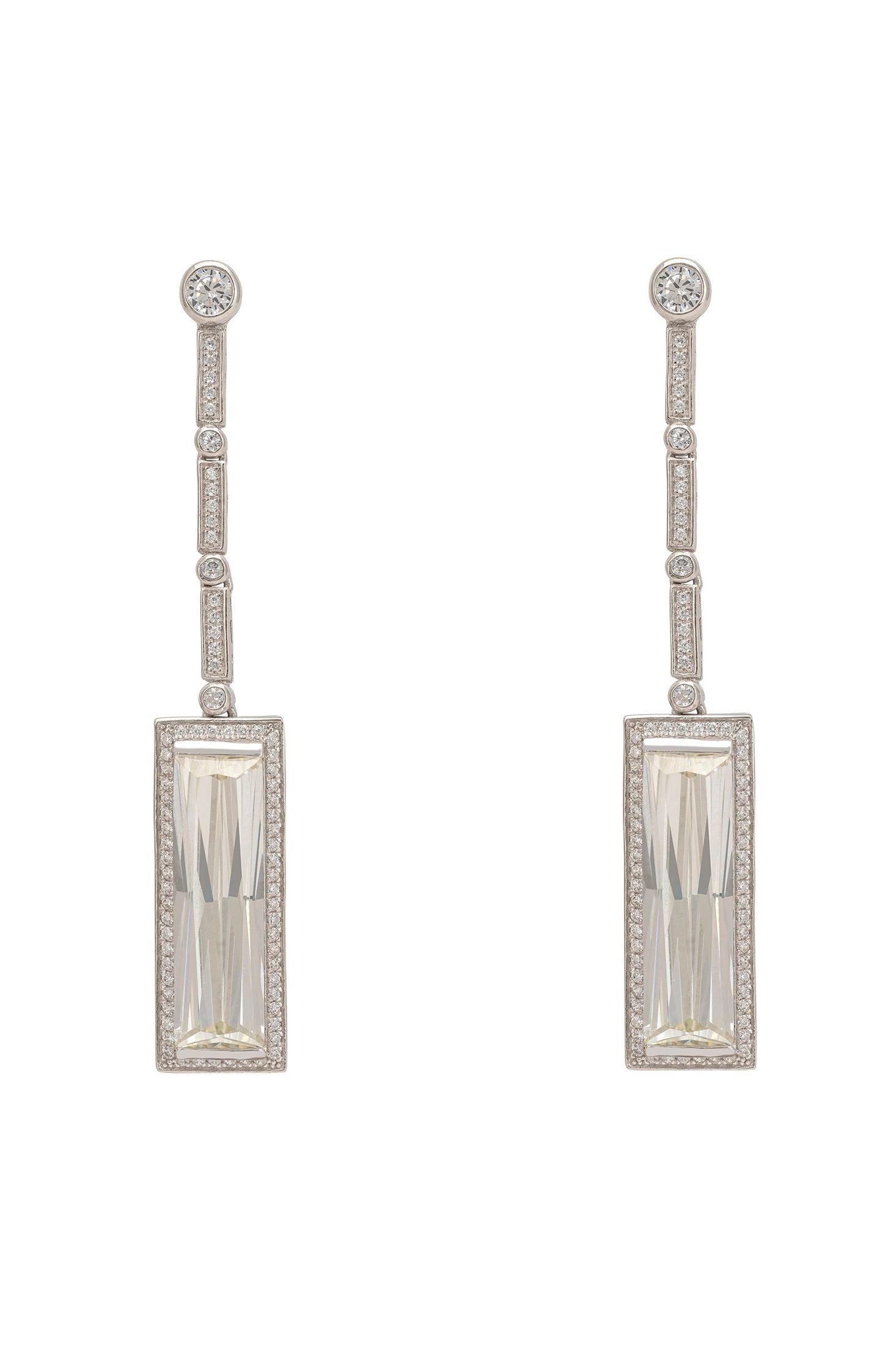 Pair of silver earrings with rectangular gemstones on a white background