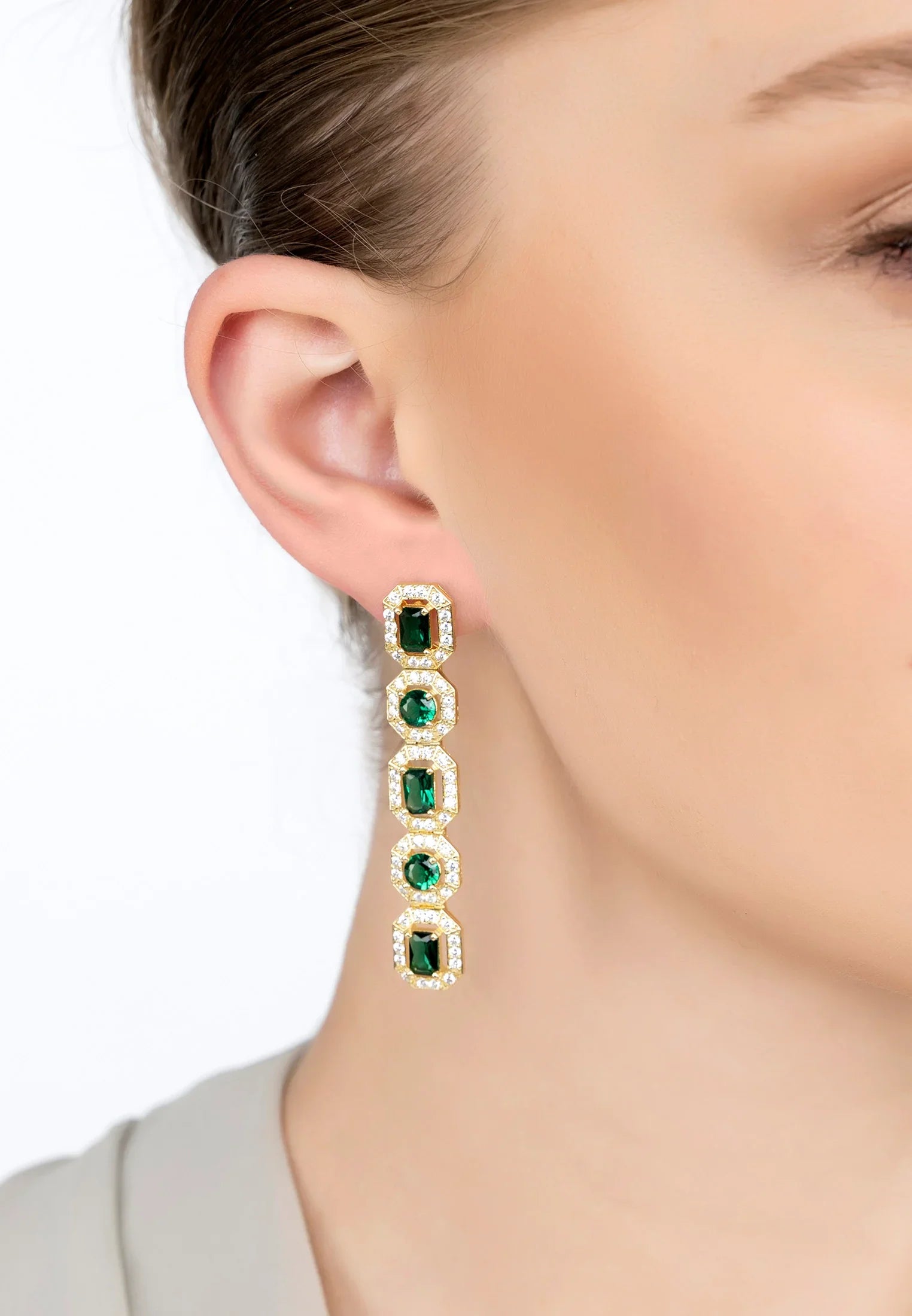 The earring worn by a model.