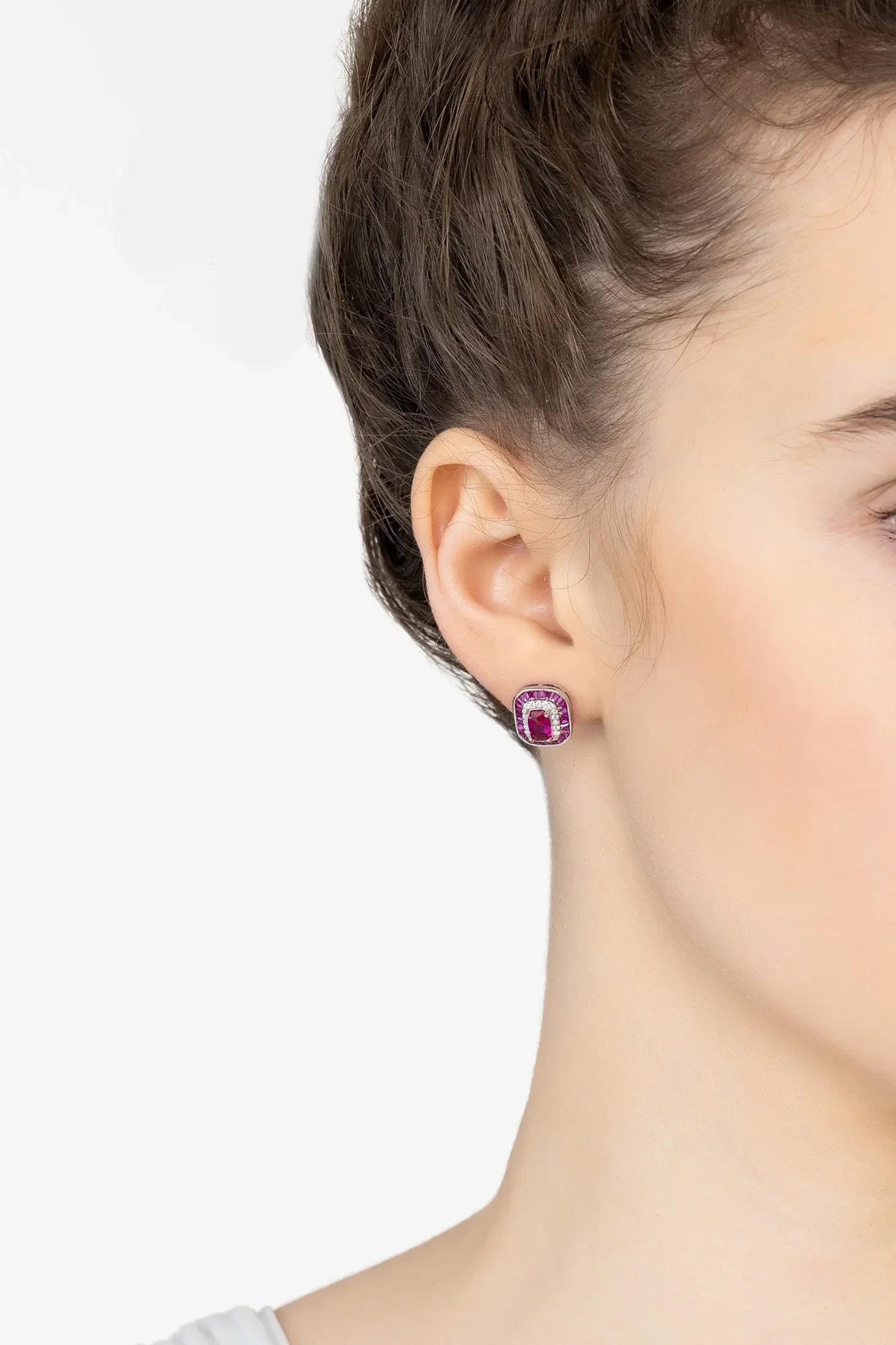 Angled view of Great Gatsby Stud Earrings Ruby Silver, showing ruby detailing, silver finish and the jewellery profile.