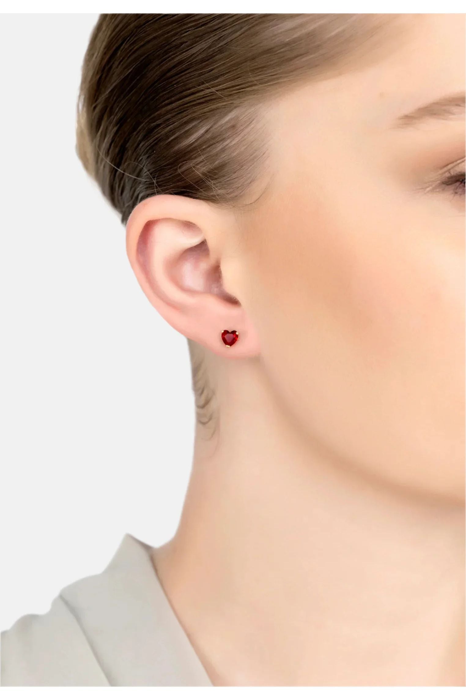 The earring worn by a model.