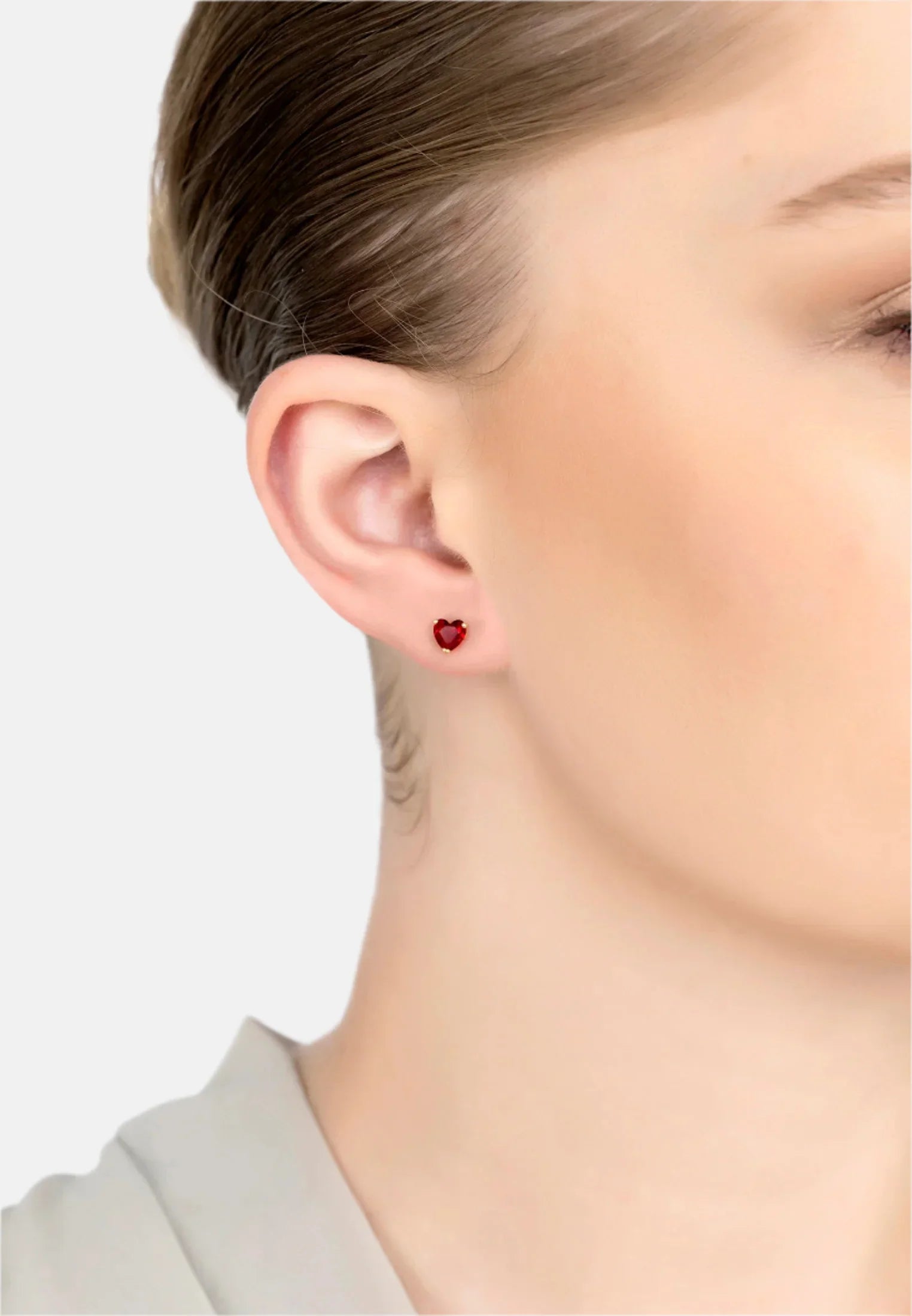 The earring worn by a model.