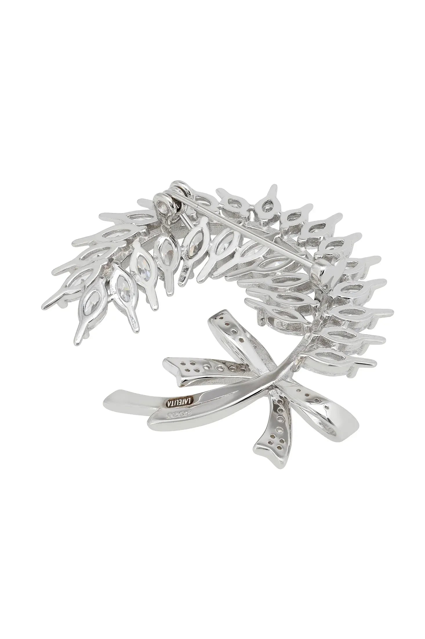 Silver pin back of the brooch.
