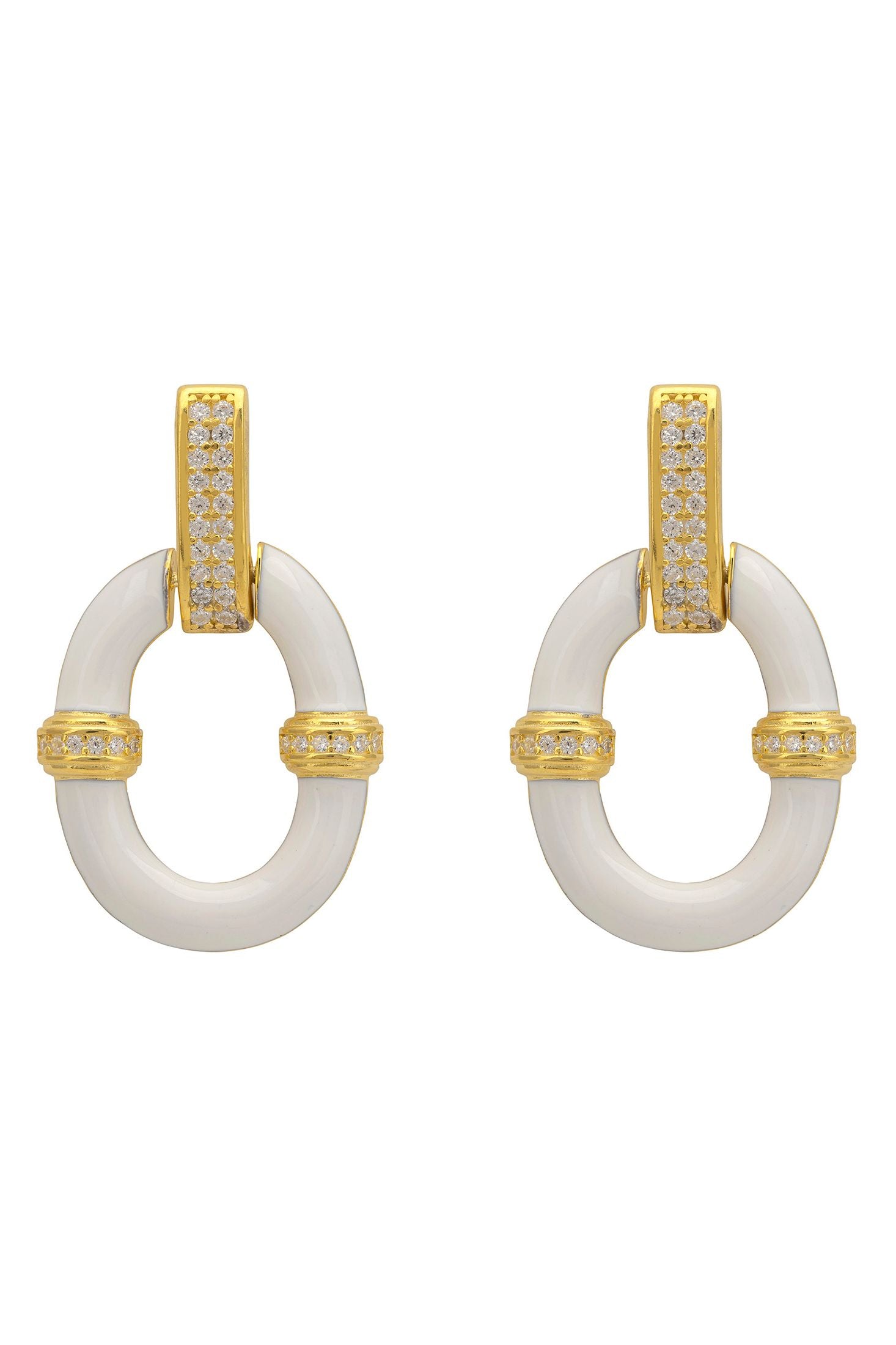 Pair of earrings with gold and white design on a white background