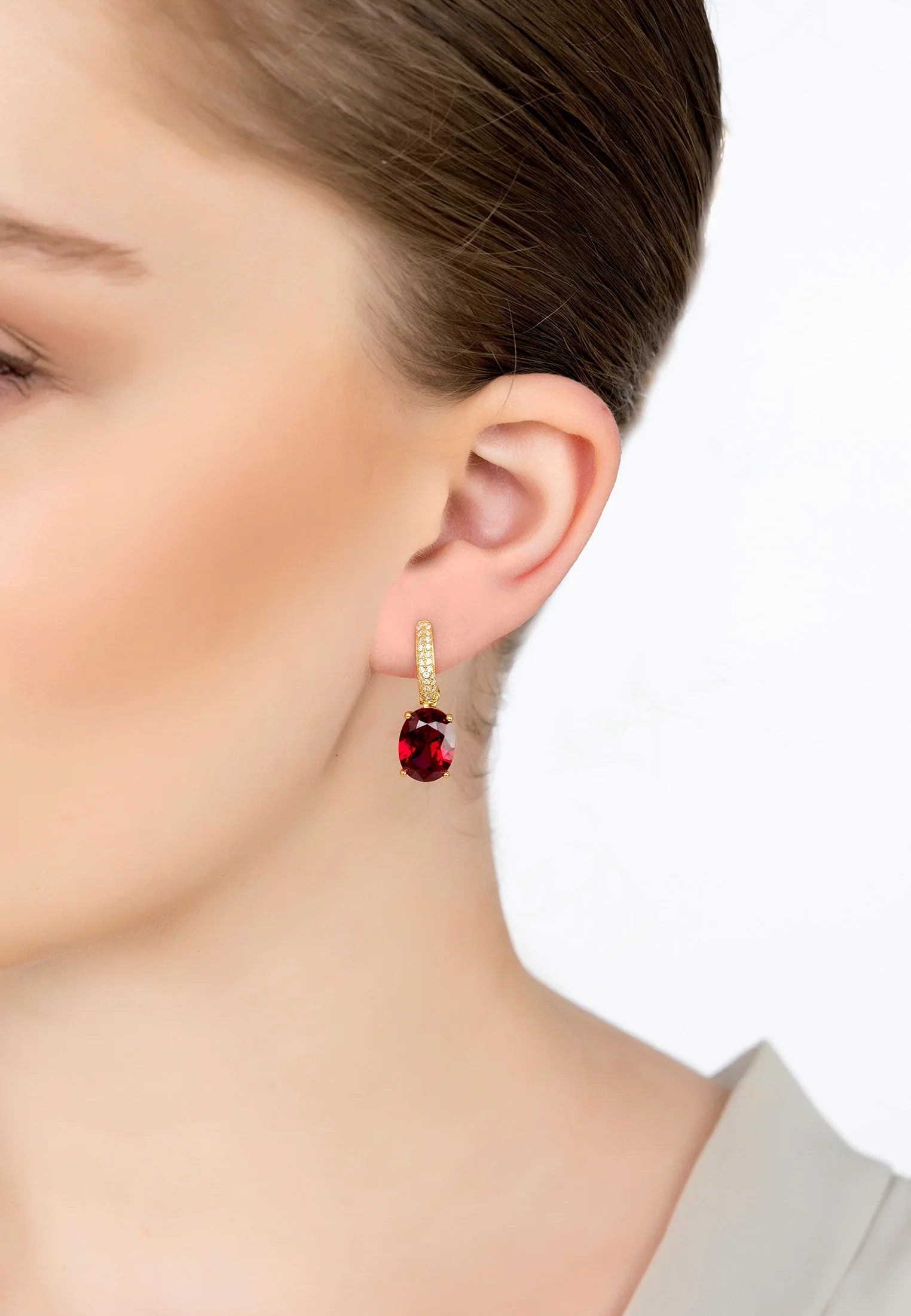 The earring worn by a model.