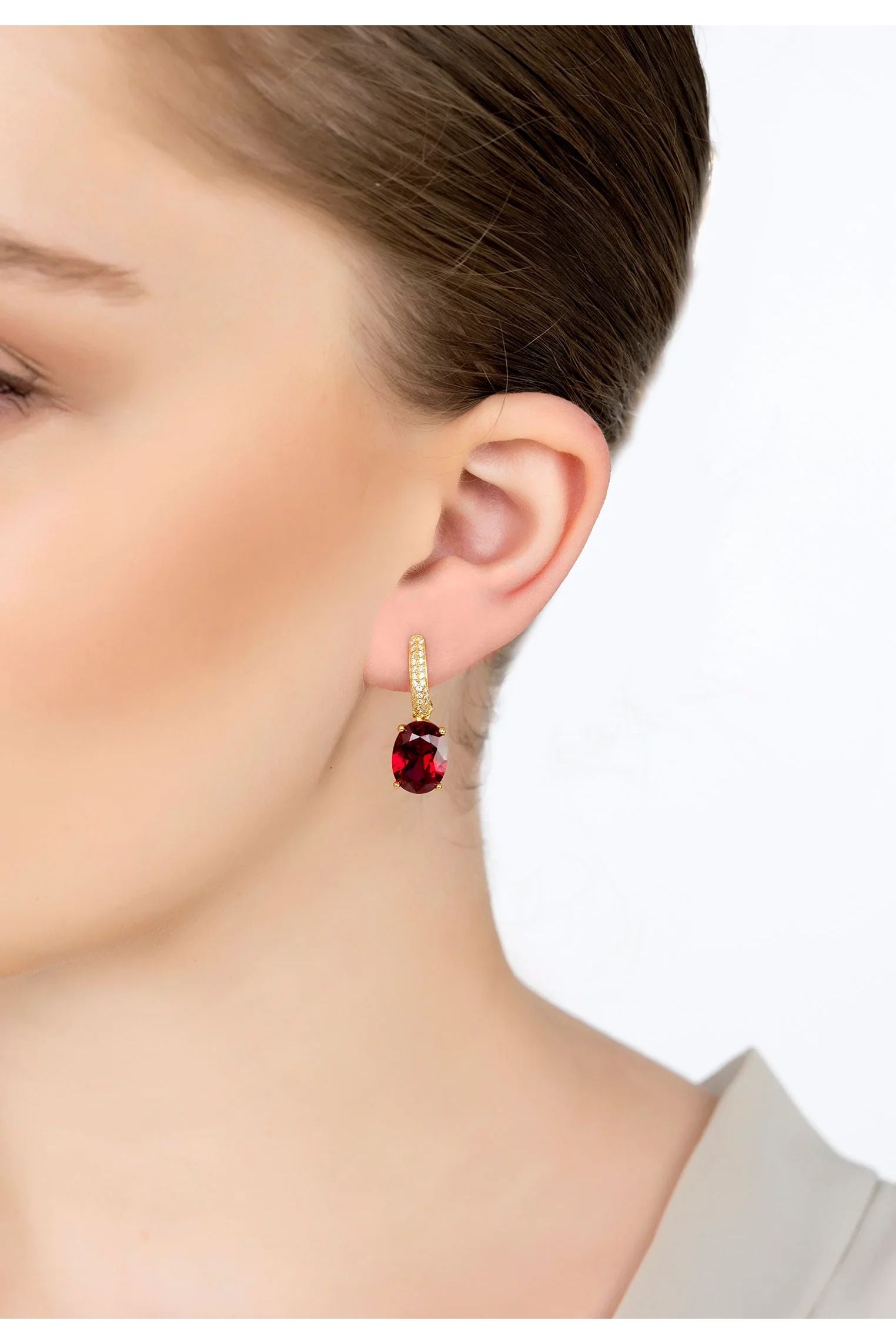 The earring worn by a model.