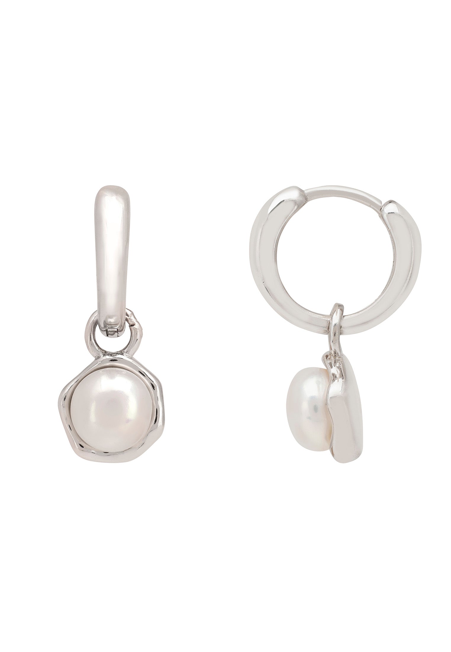 Silver earrings with pearls on a white background