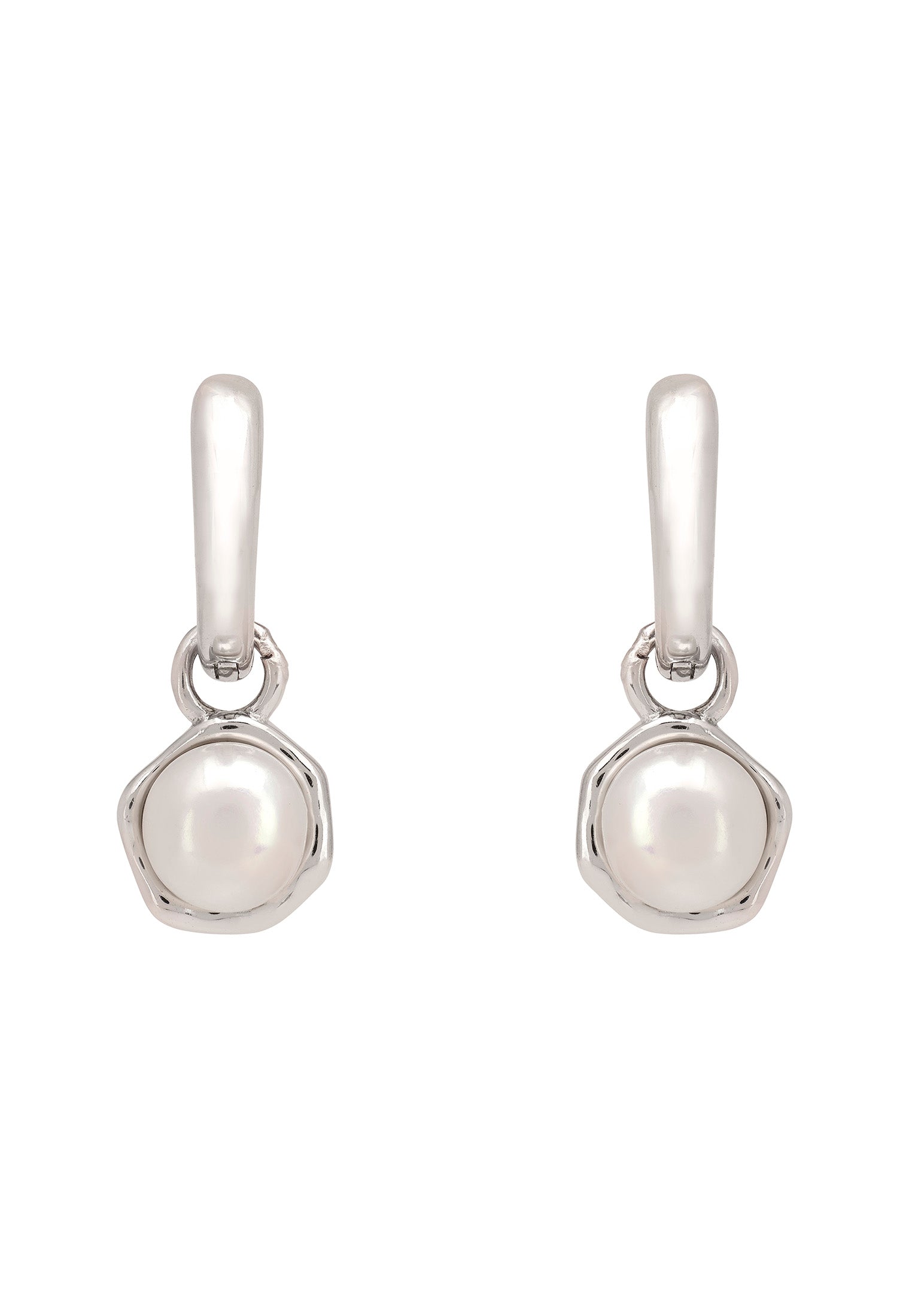 Pair of silver earrings with round pearls on a white background