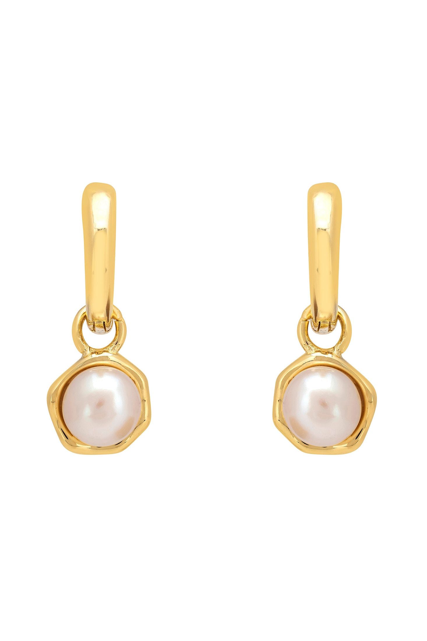 Gold earrings with pearl drops on a white background