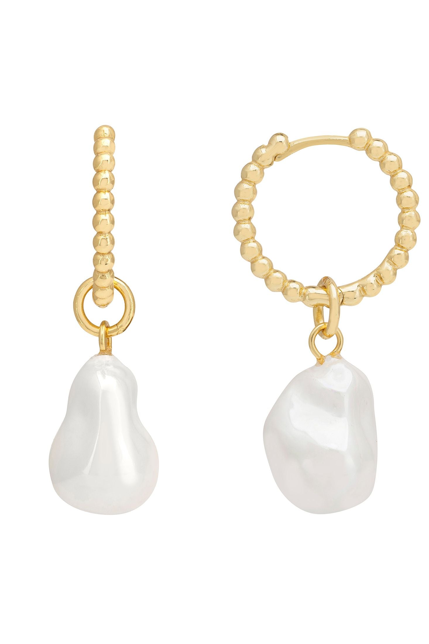 Pair of earrings with gold loops and white pearls on a white background