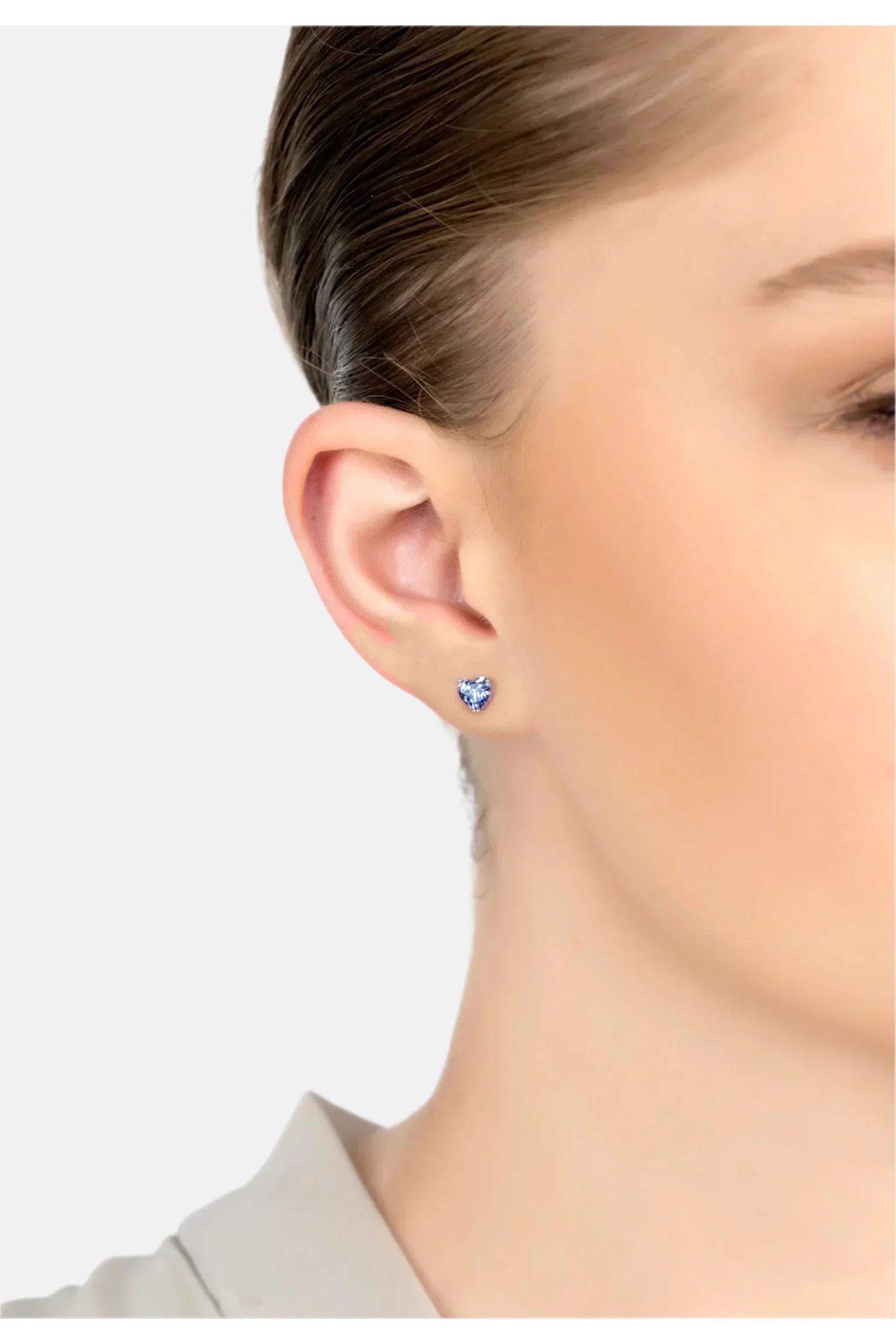 The earring worn by a model.