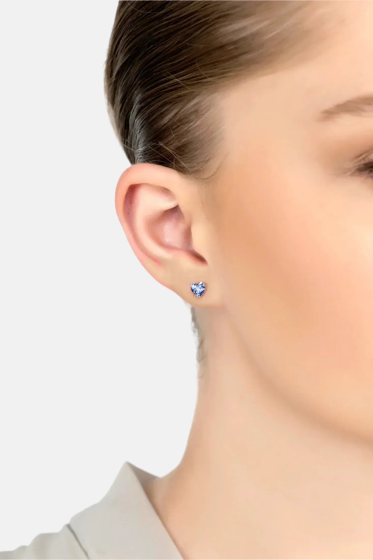 The earring worn by a model.