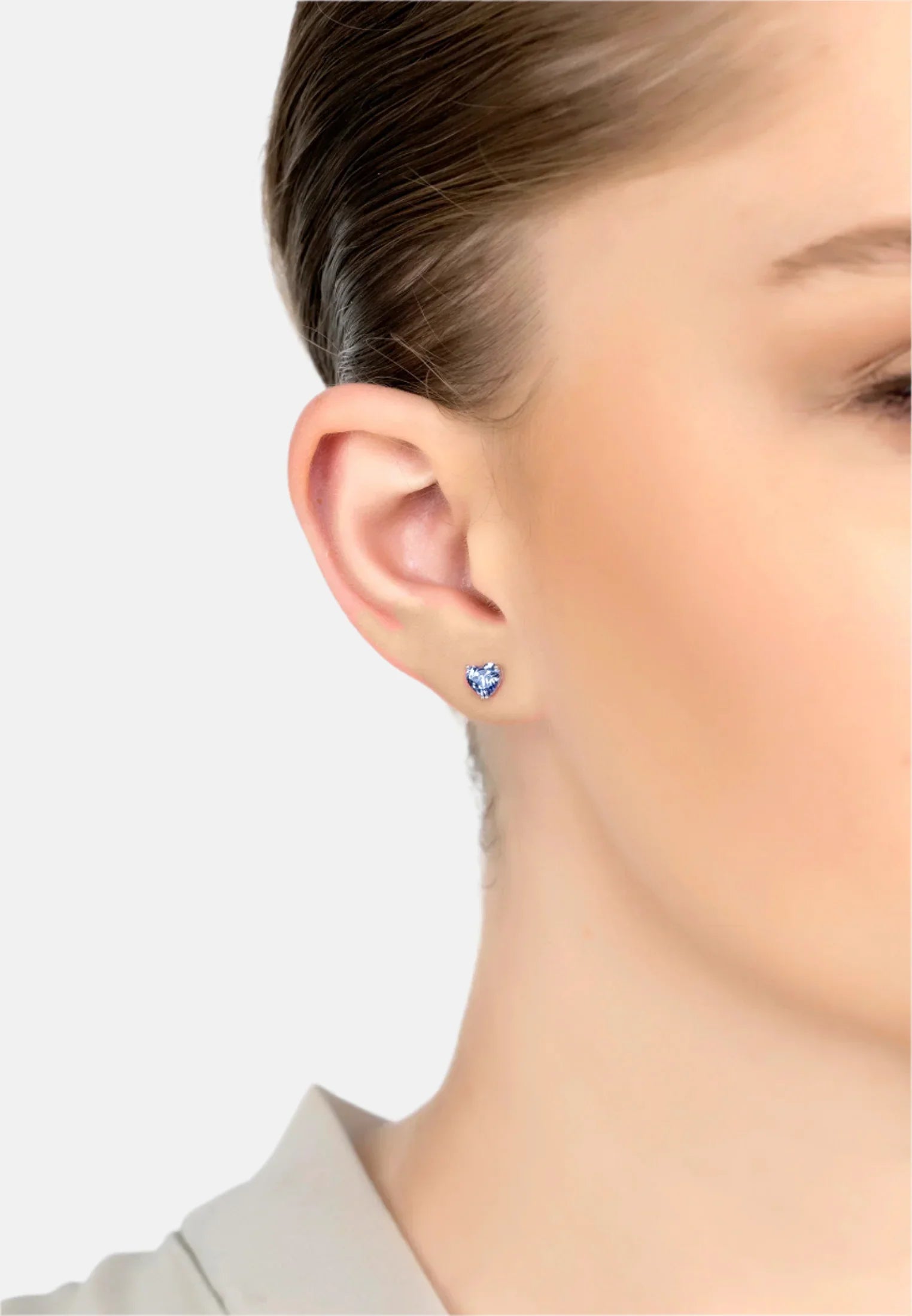 The earring worn by a model.