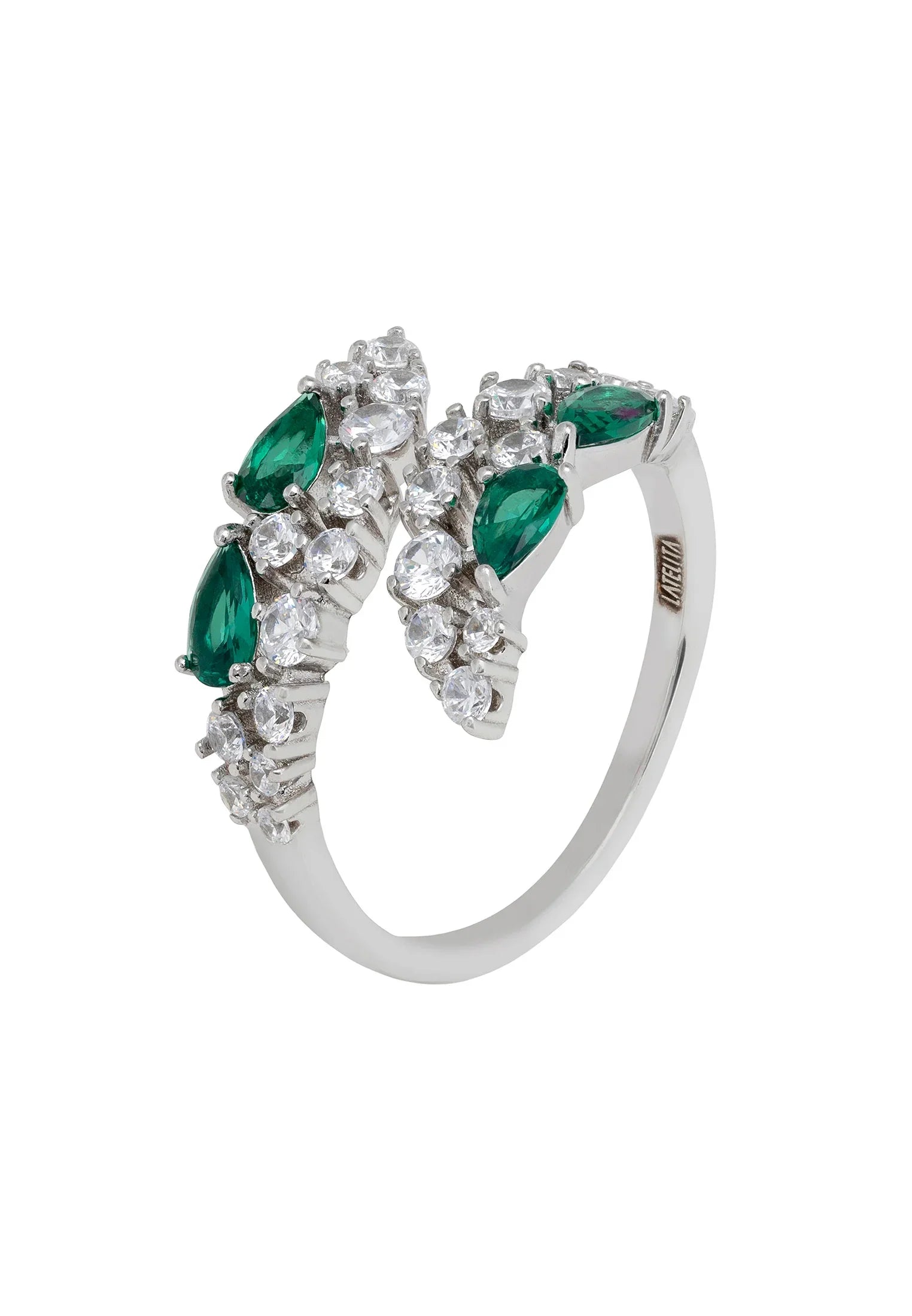 Emerald teardrops diamond ring.
