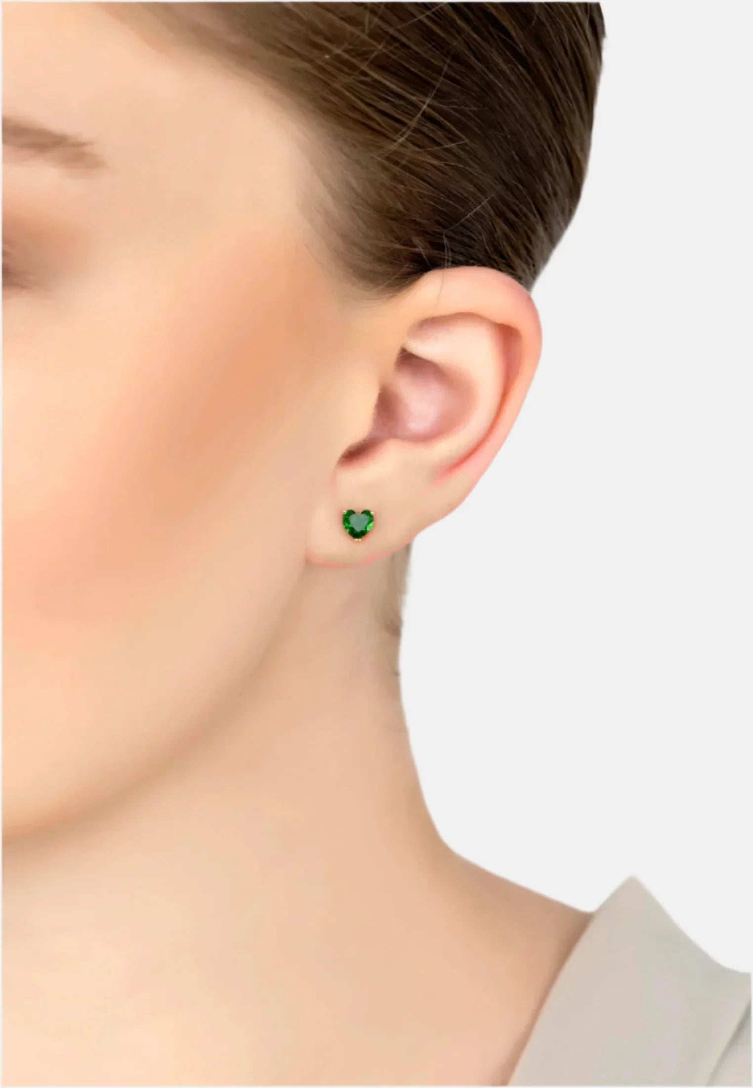 The earring worn by a model.