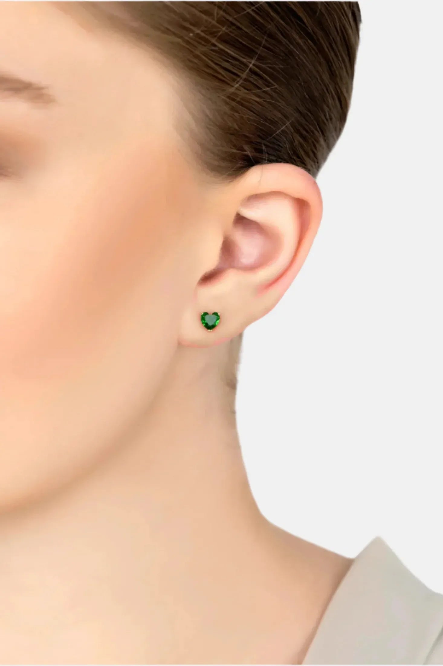 The earring worn by a model.