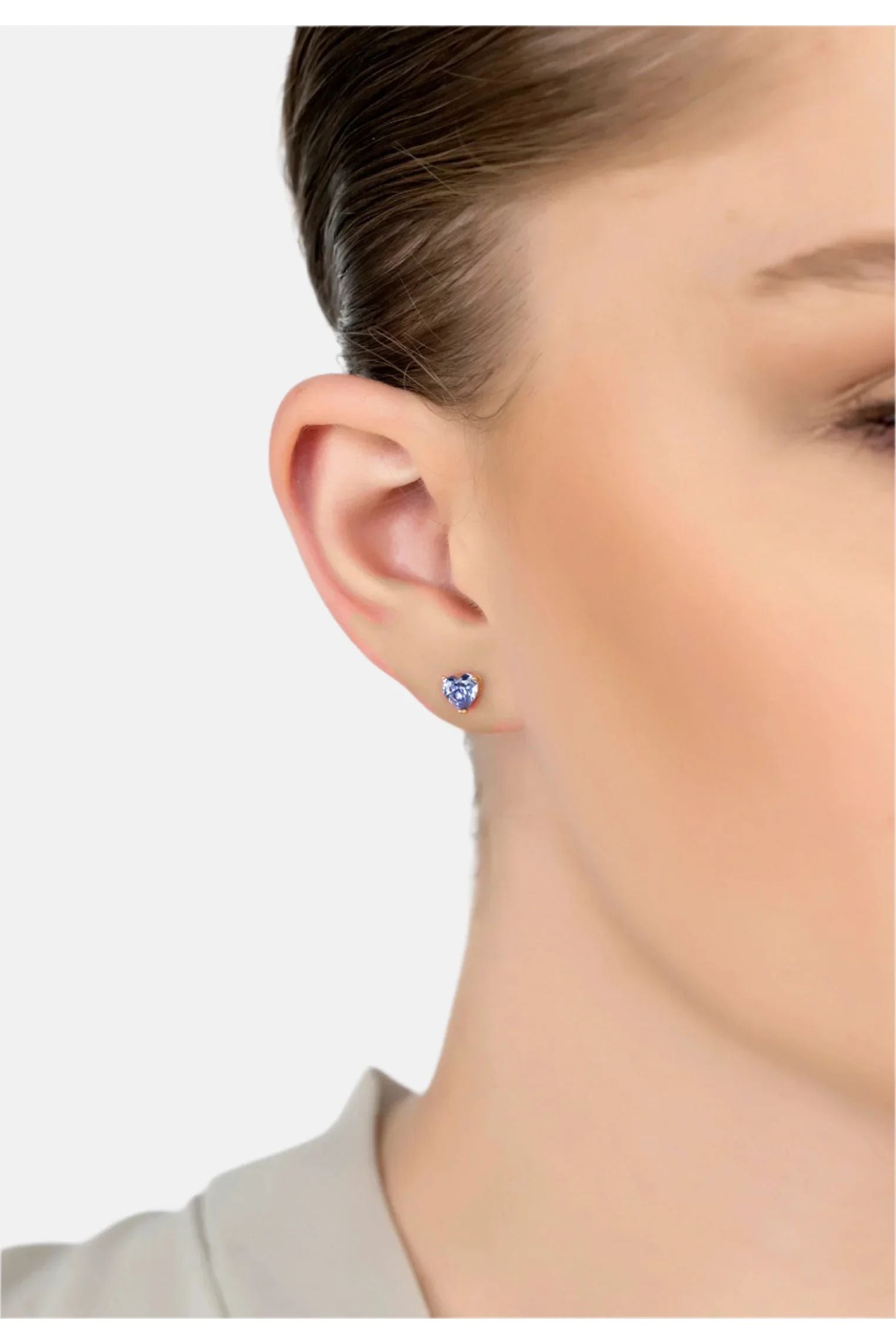 The earring worn by a model.